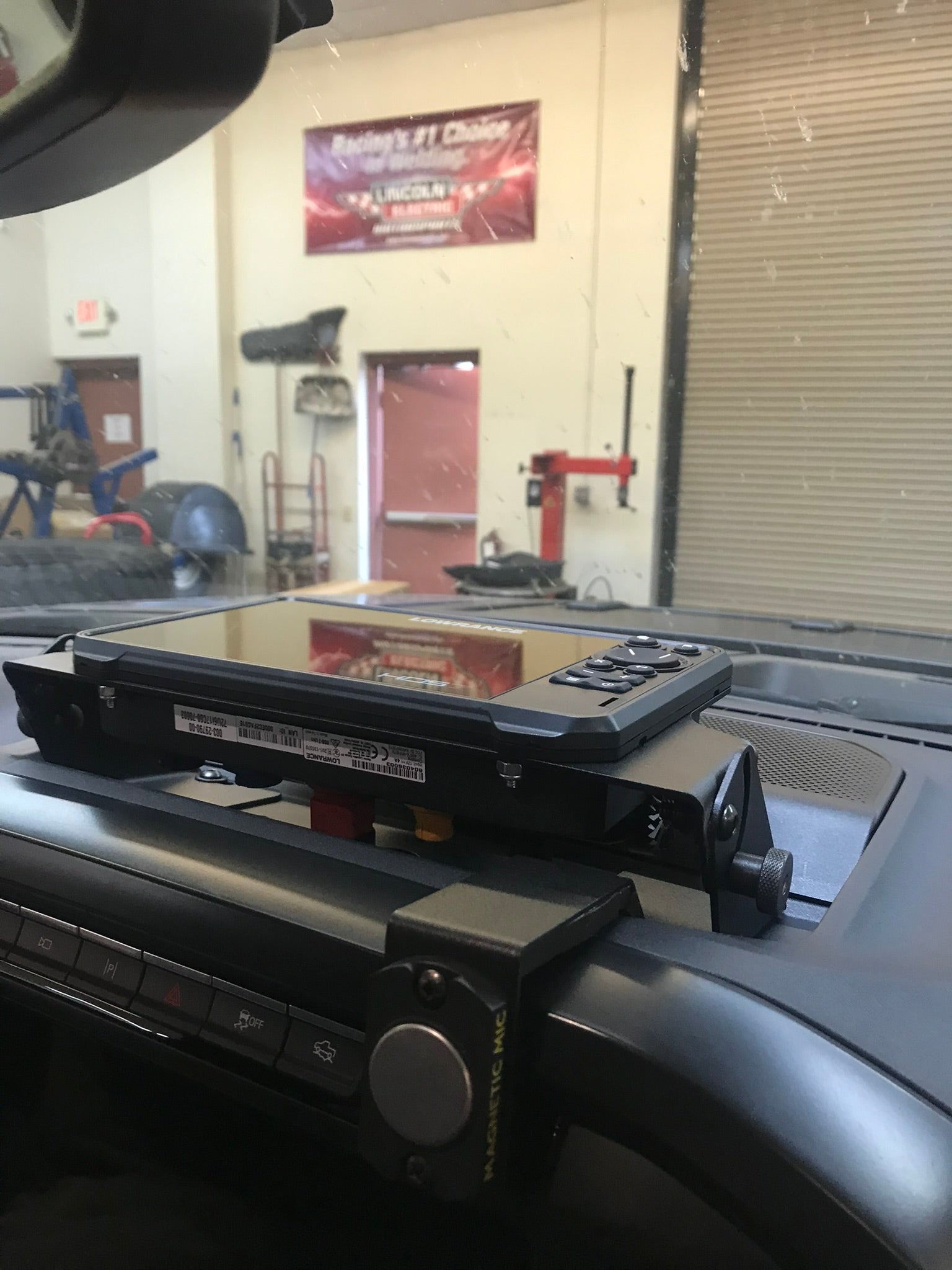 Center dash fold-down GPS mount for 2021-2024 F150 and Gen 3 Raptor, featuring HDS7 Live display.