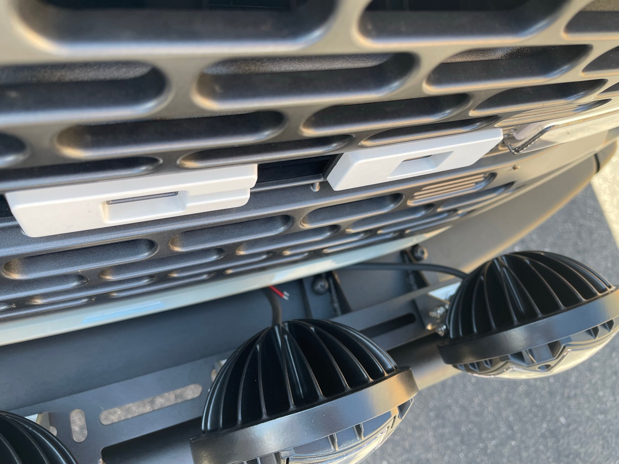 Front light mount kit for 6th Gen Bronco's modular stock bumper, compatible with various light types.