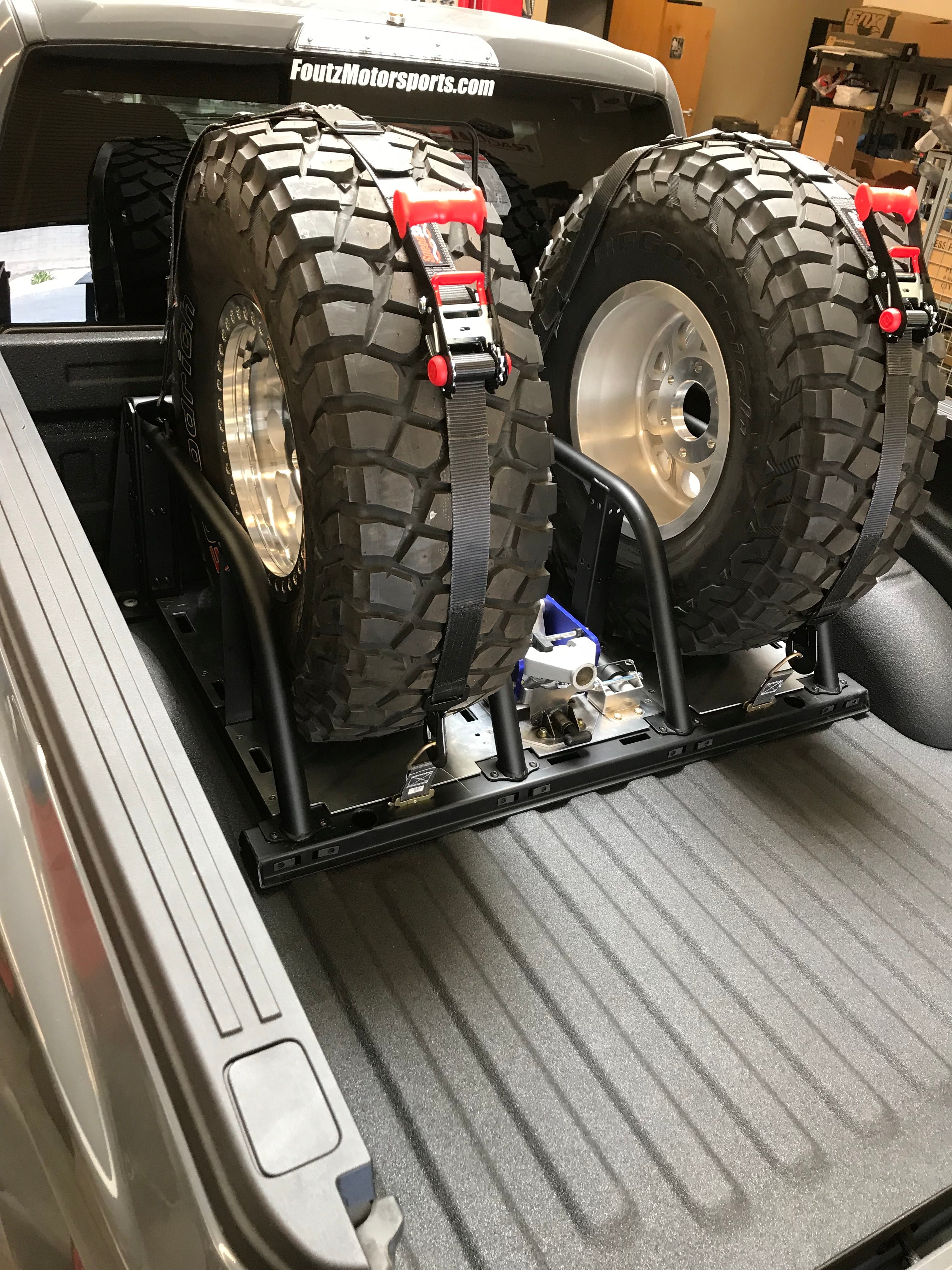 2021+ Raptor 5-Link Rear Bed Organizer for 3.0x16 Coil Over or 3.5x16 Bypass Shock with mounted spare tires in truck bed.