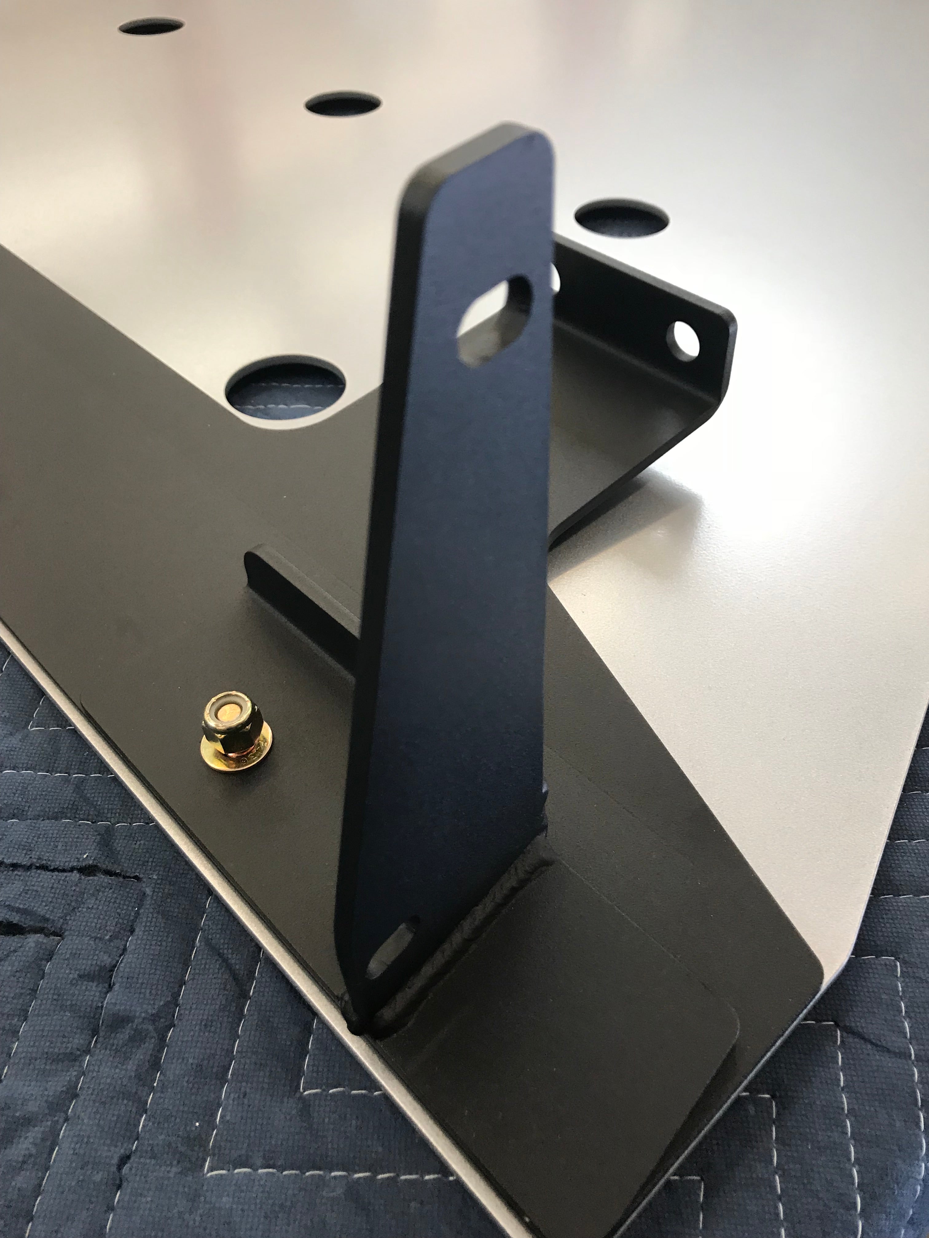 2019 and newer Ford Ranger skid plate showcasing durable metal construction and mounting hardware for offroad protection.