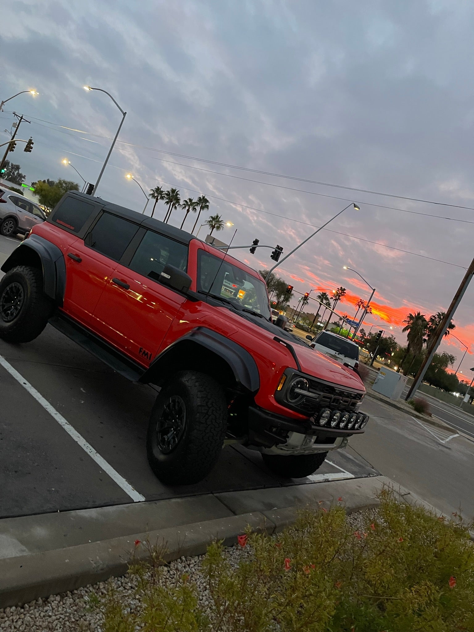 2022-UP Bronco Raptor parked with a front light mount kit, showcasing versatility for any light installation.