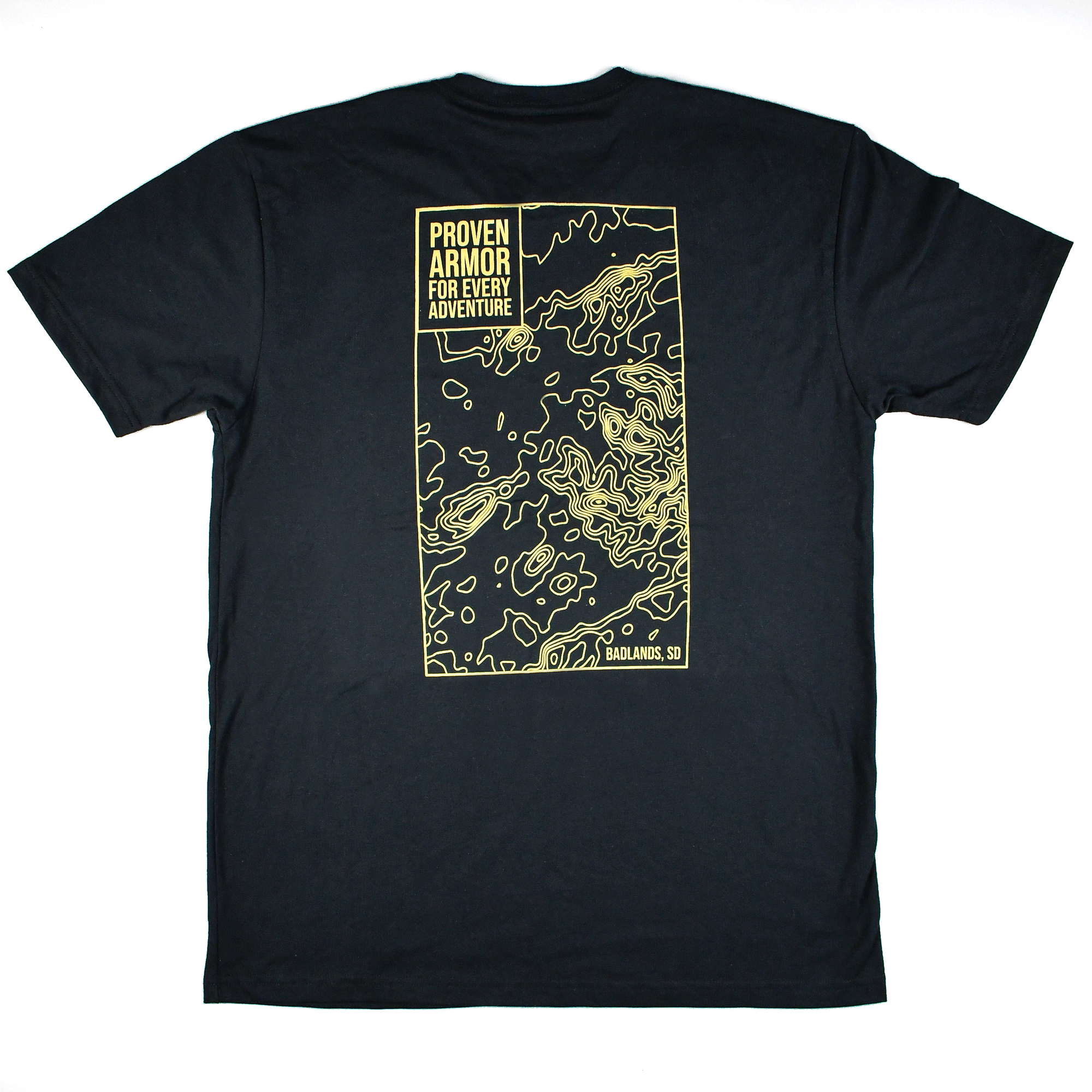 Black Badlands Tee featuring a yellow graphic design with the text "Proven Armor for Every Adventure" on the back.