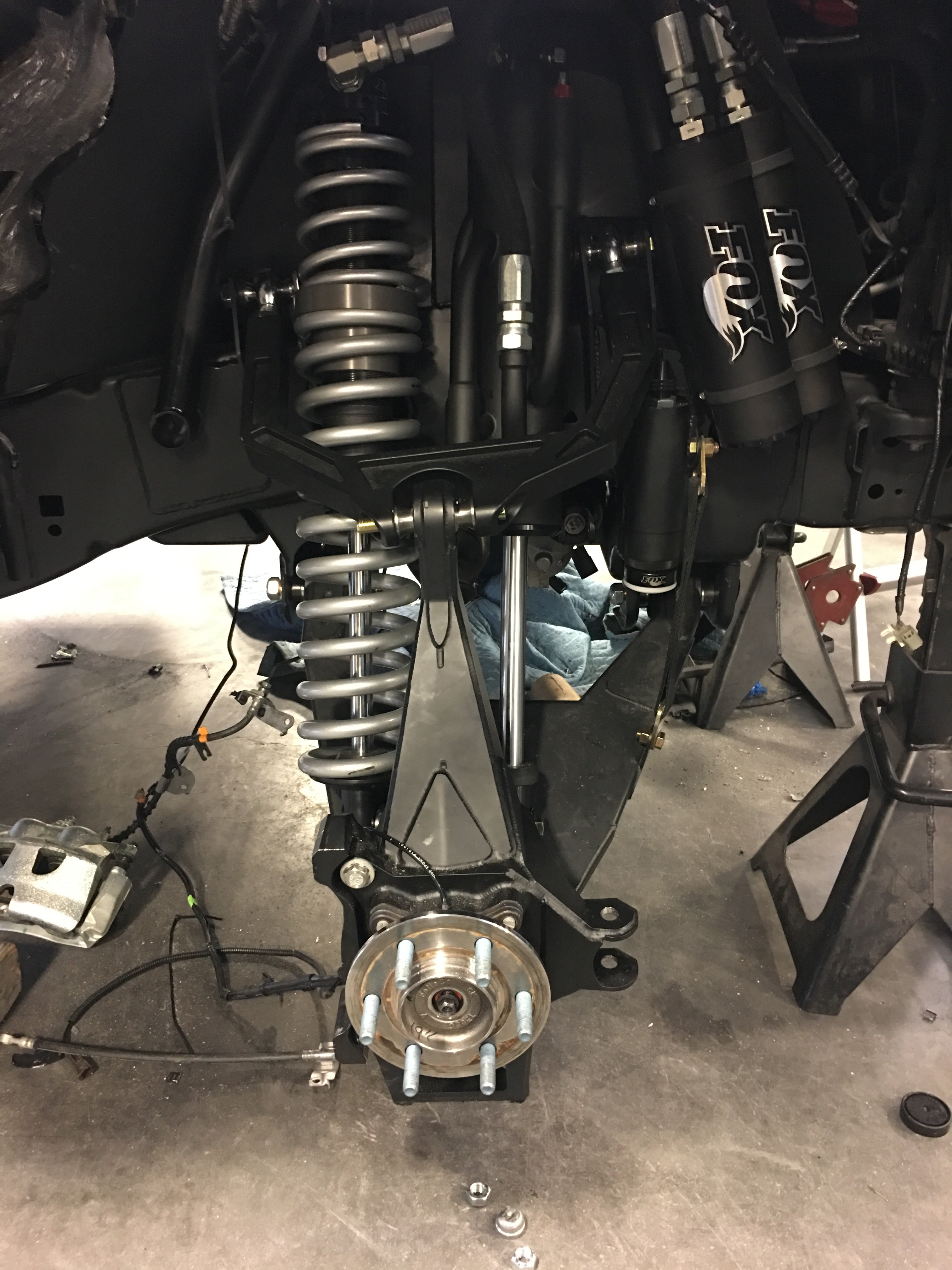 2017 Up Raptor Long Travel Front Suspension Kit showcasing advanced suspension components and installation details.