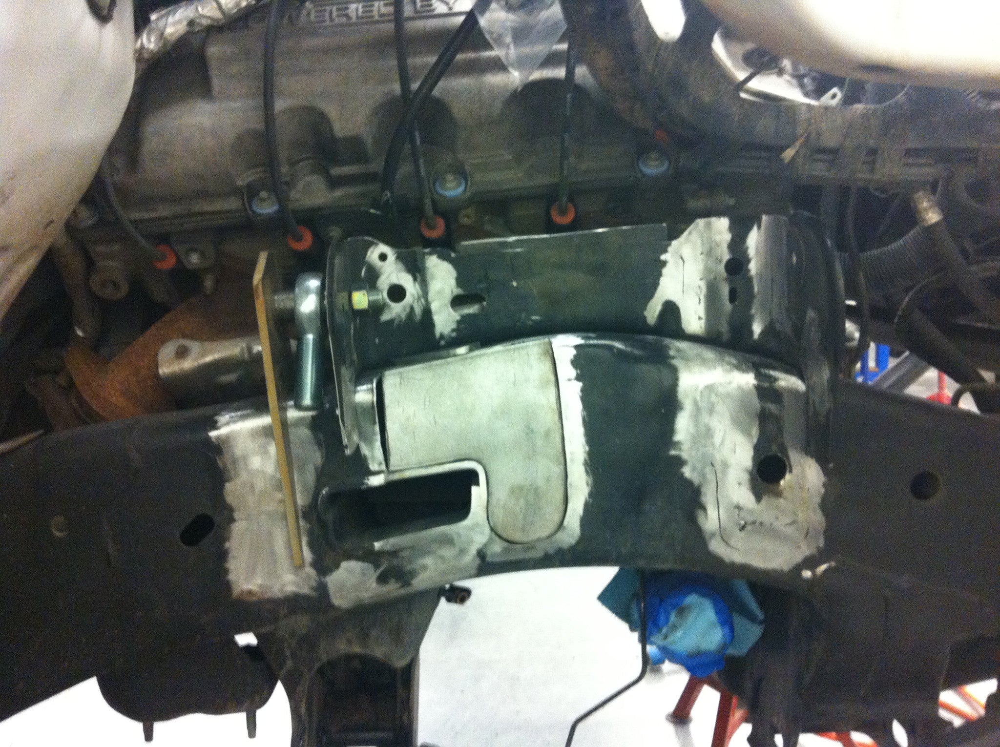 Long travel front suspension kit for 2010-2014 Raptor, showcasing metal components and installation details.