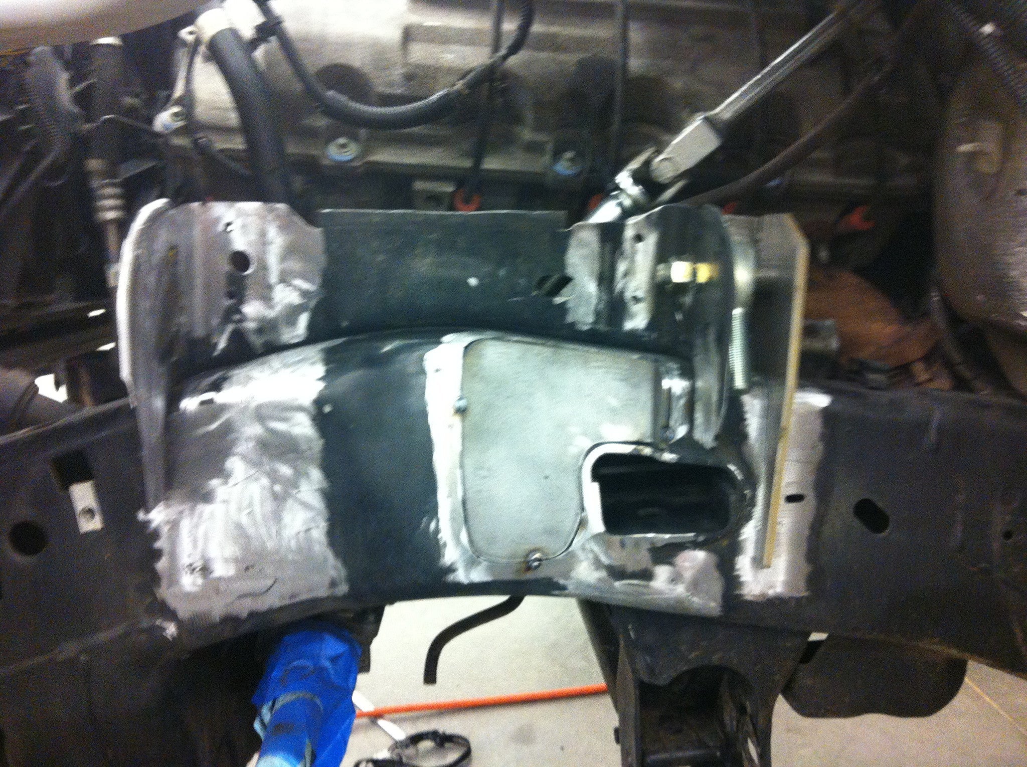 Long travel front suspension kit for 2010-2014 Raptor, showcasing installation details and components.