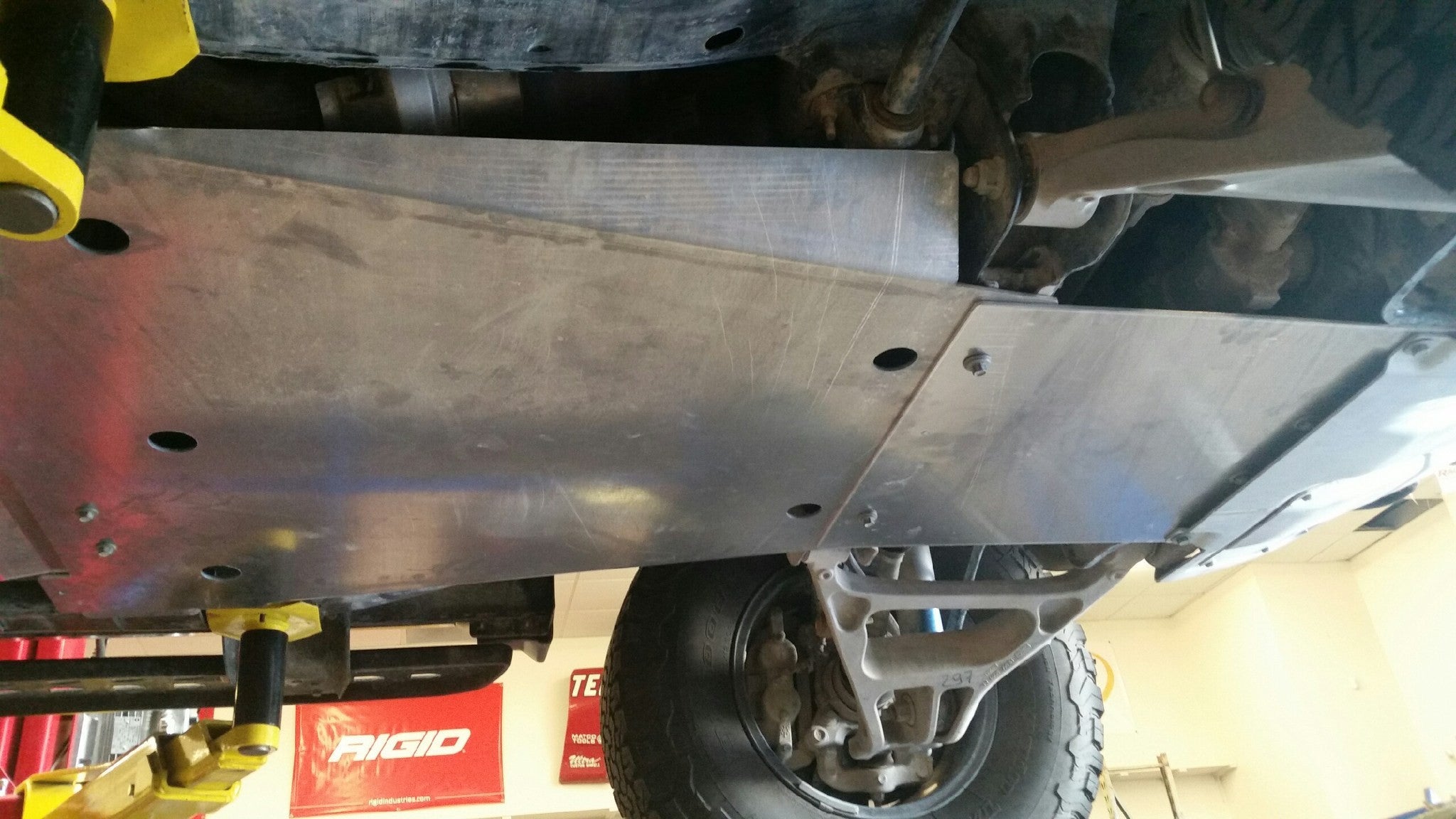 Skid plate kit for 2017-2024 Ford Raptor and Raptor-R, showcasing durable aluminum protection under the vehicle.