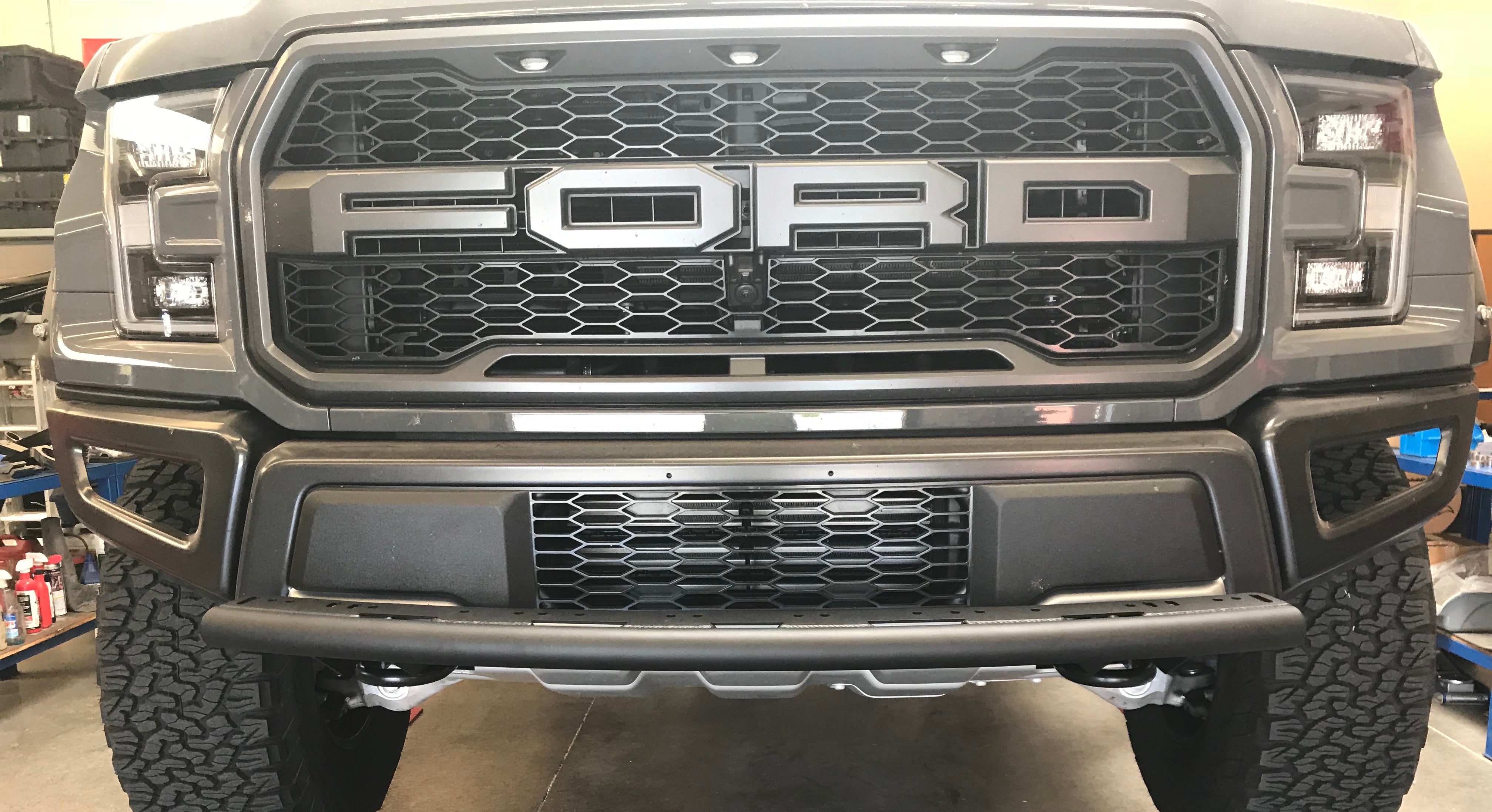 Single tube light mount for 2015+ F150 and 2017+ Raptor, designed for stock bumpers, enhancing off-road lighting options.