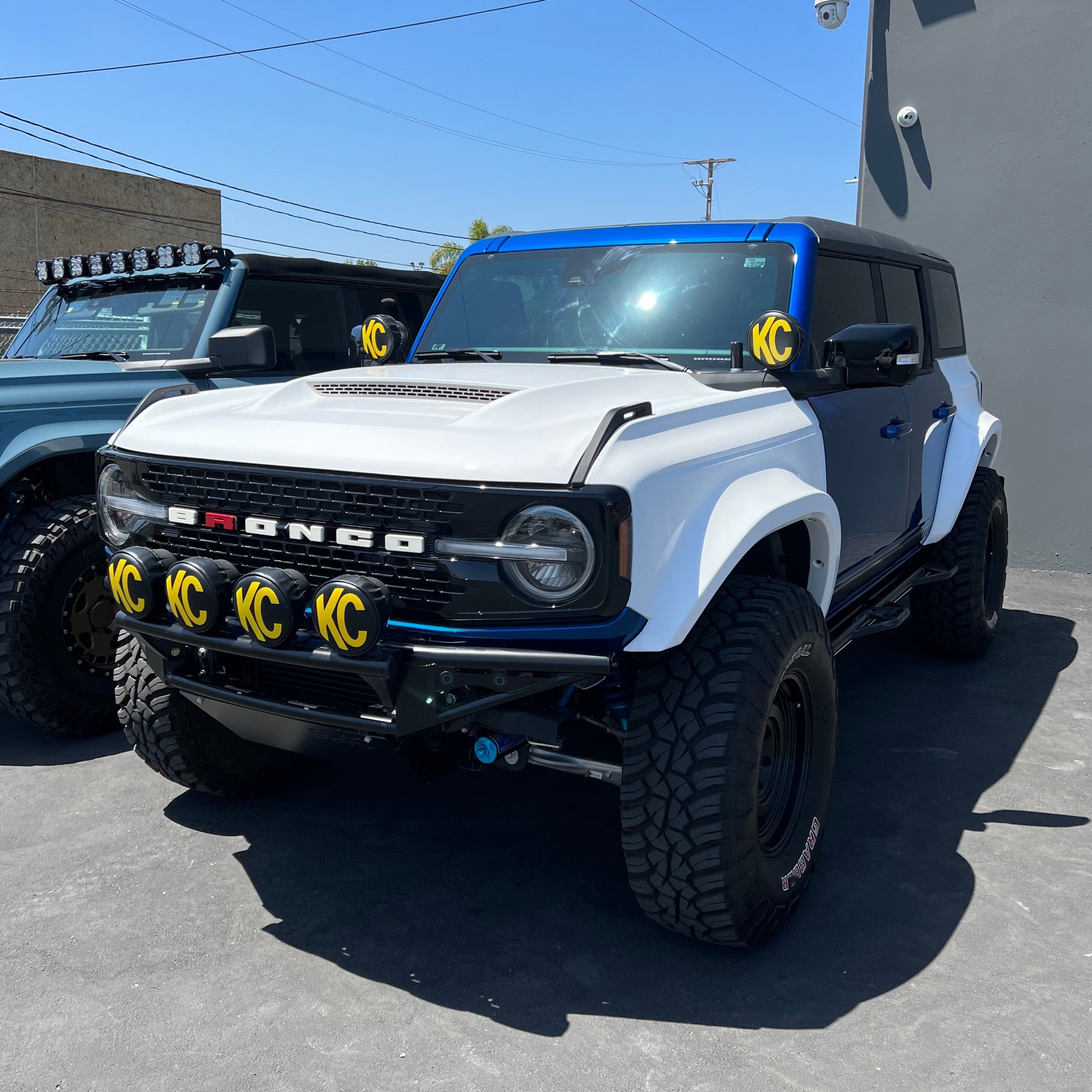 2021-2025 Ford Bronco 4-Door with a custom rear quarter kit, showcasing an offroad-ready design and rugged tires.