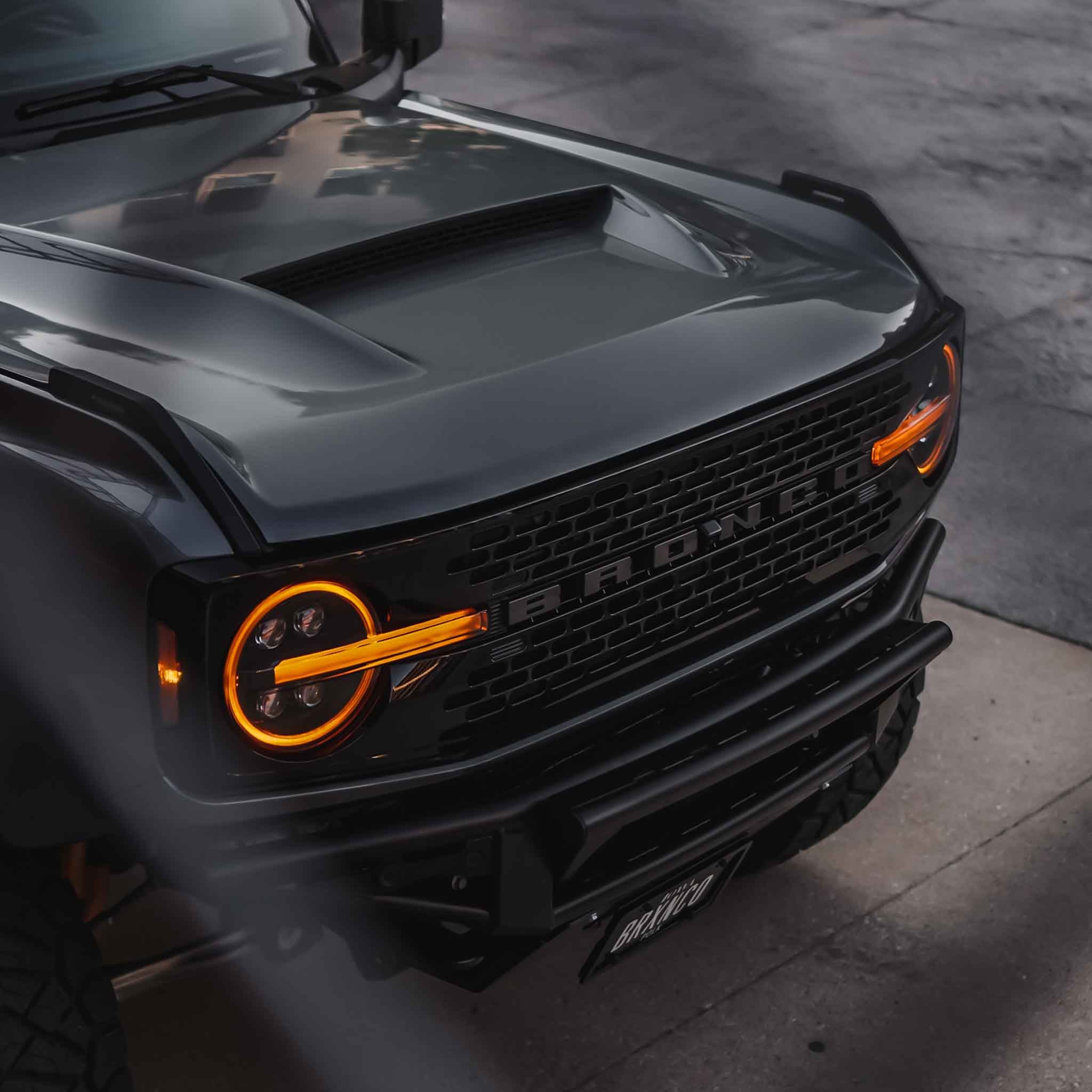 2021-2025 Ford Bronco Ram Air Hood showcasing a sleek design with a prominent air scoop and bold front grille.