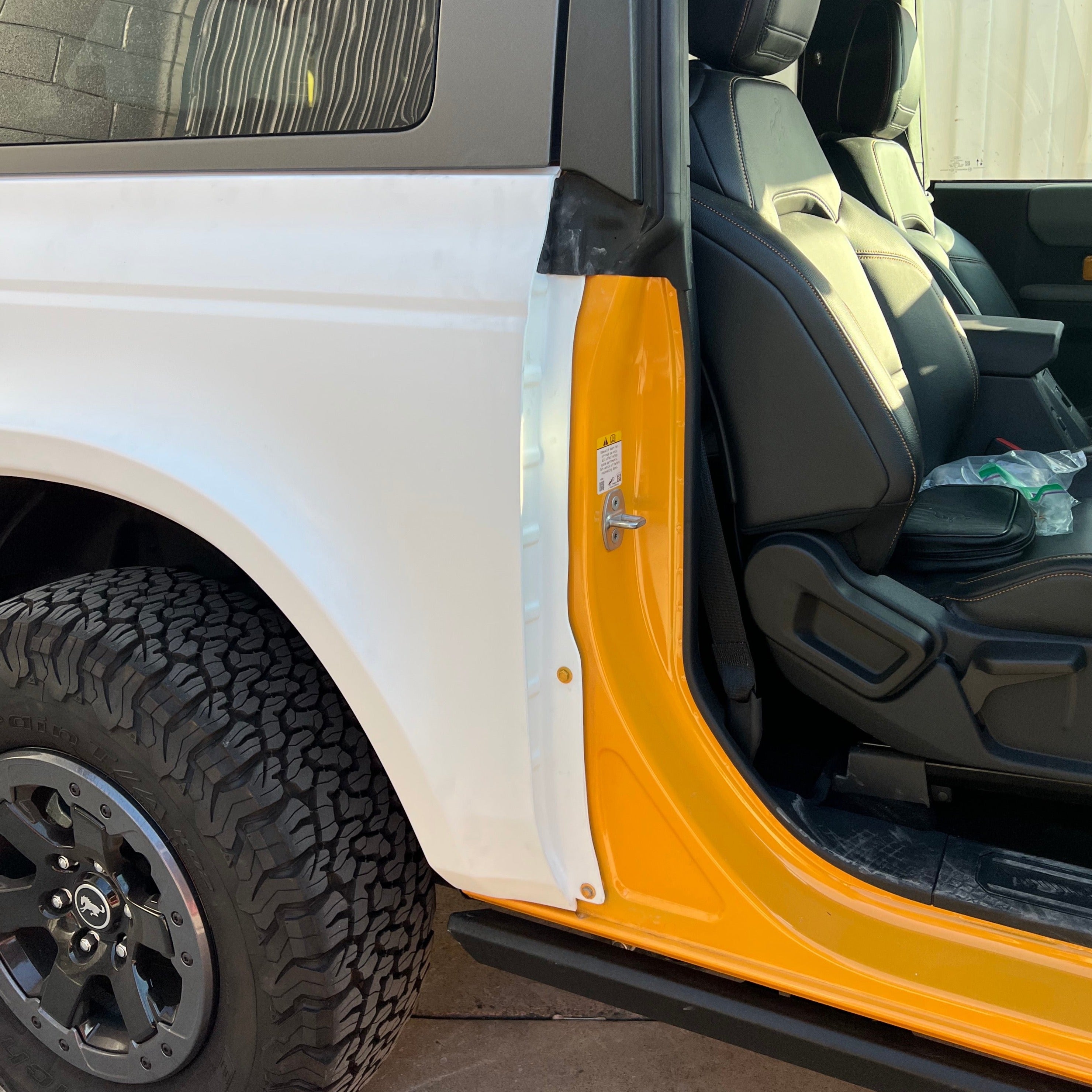 2021-2025 Ford Bronco 2-Door Rear Quarter Kit showcasing the vehicle's rear quarter panel and interior seating.