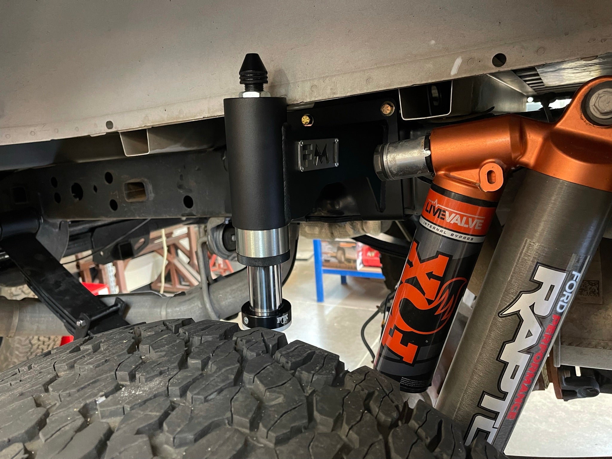 Rear bump stop kit installed on a 2017-2020 Raptor and 2015-2024 F150, enhancing off-road performance and suspension support.
