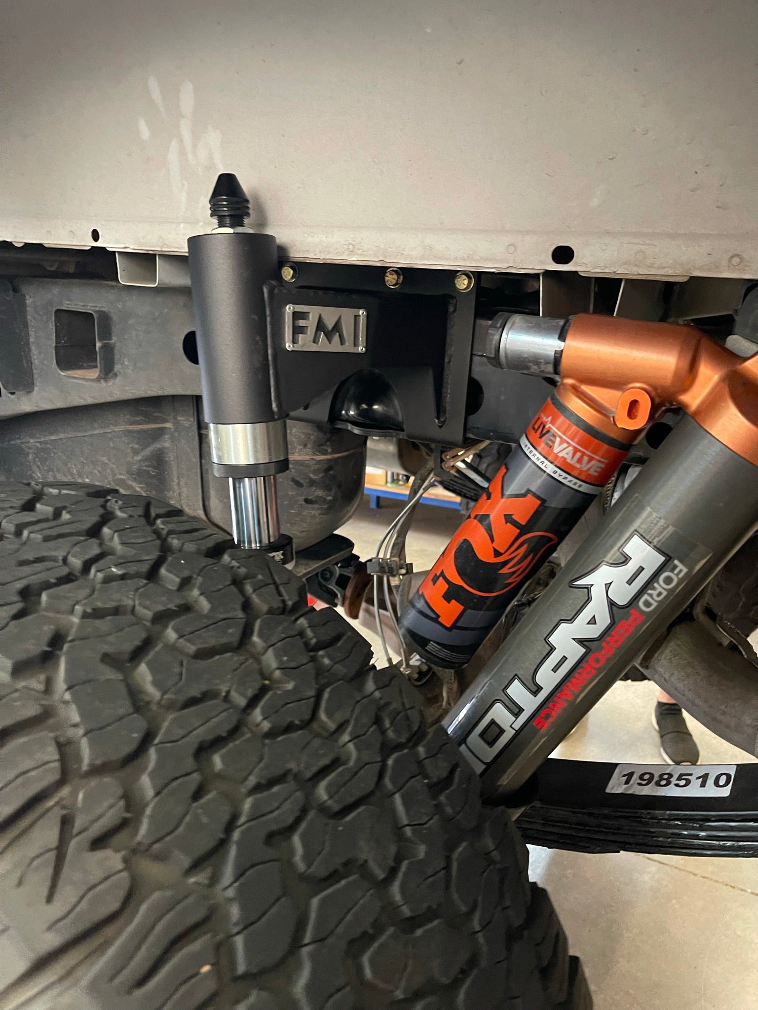 Rear bump stop kit installed on a 2017-2020 Raptor and 2015-2024 F150, showcasing suspension components and tire clearance.