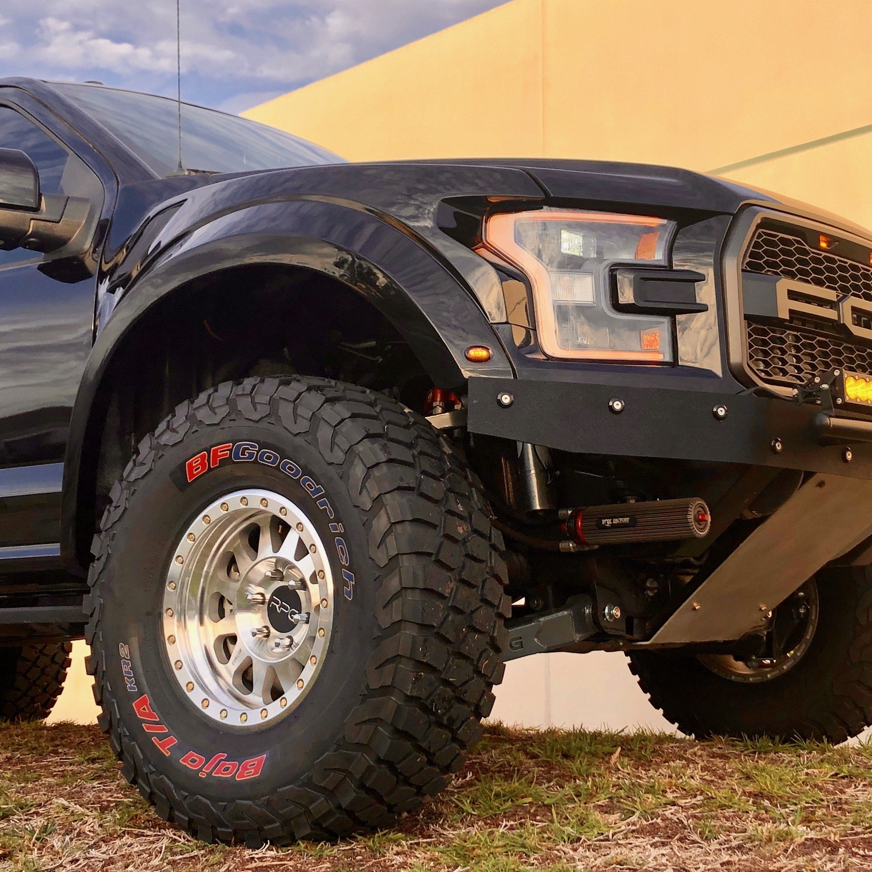 2017-2020 Ford Raptor fenders showcasing rugged design and off-road capability with aggressive tires and suspension.