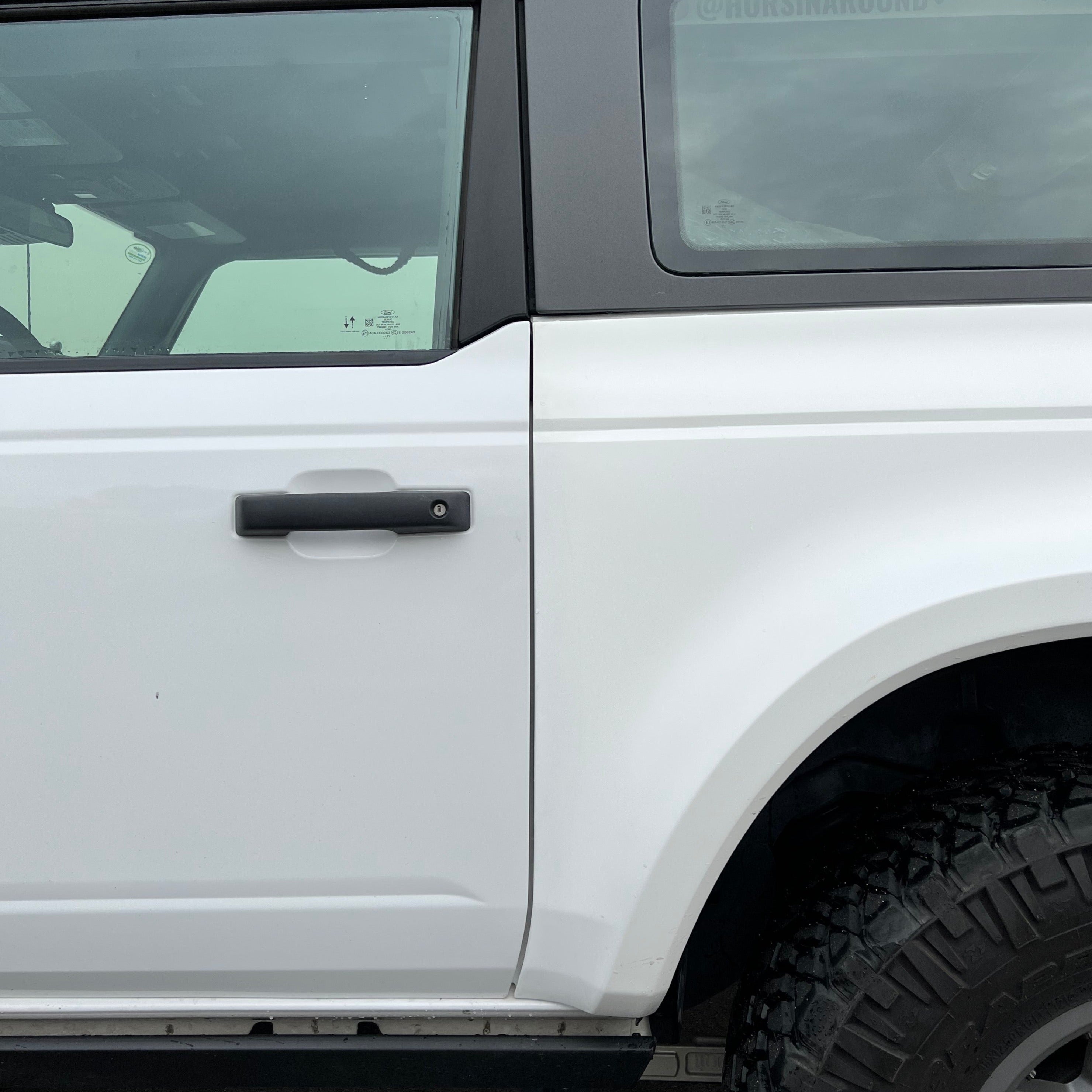 2021-2025 Ford Bronco 2-Door Rear Quarter Kit showcasing the rear panel design and door handle on a white vehicle.