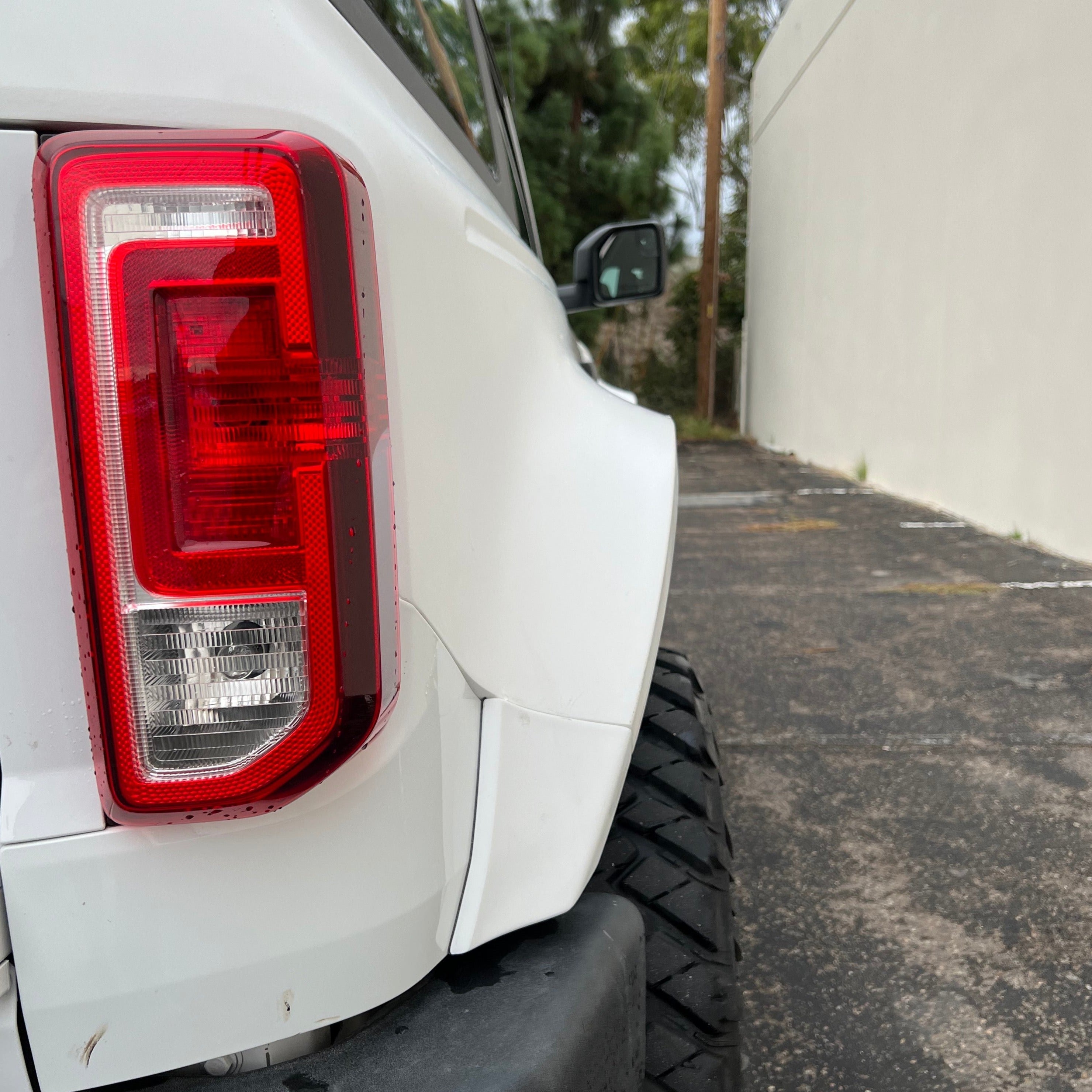 2021-2025 Ford Bronco 2-Door Rear Quarter Kit showcasing the rear fender and taillight on a white Bronco.