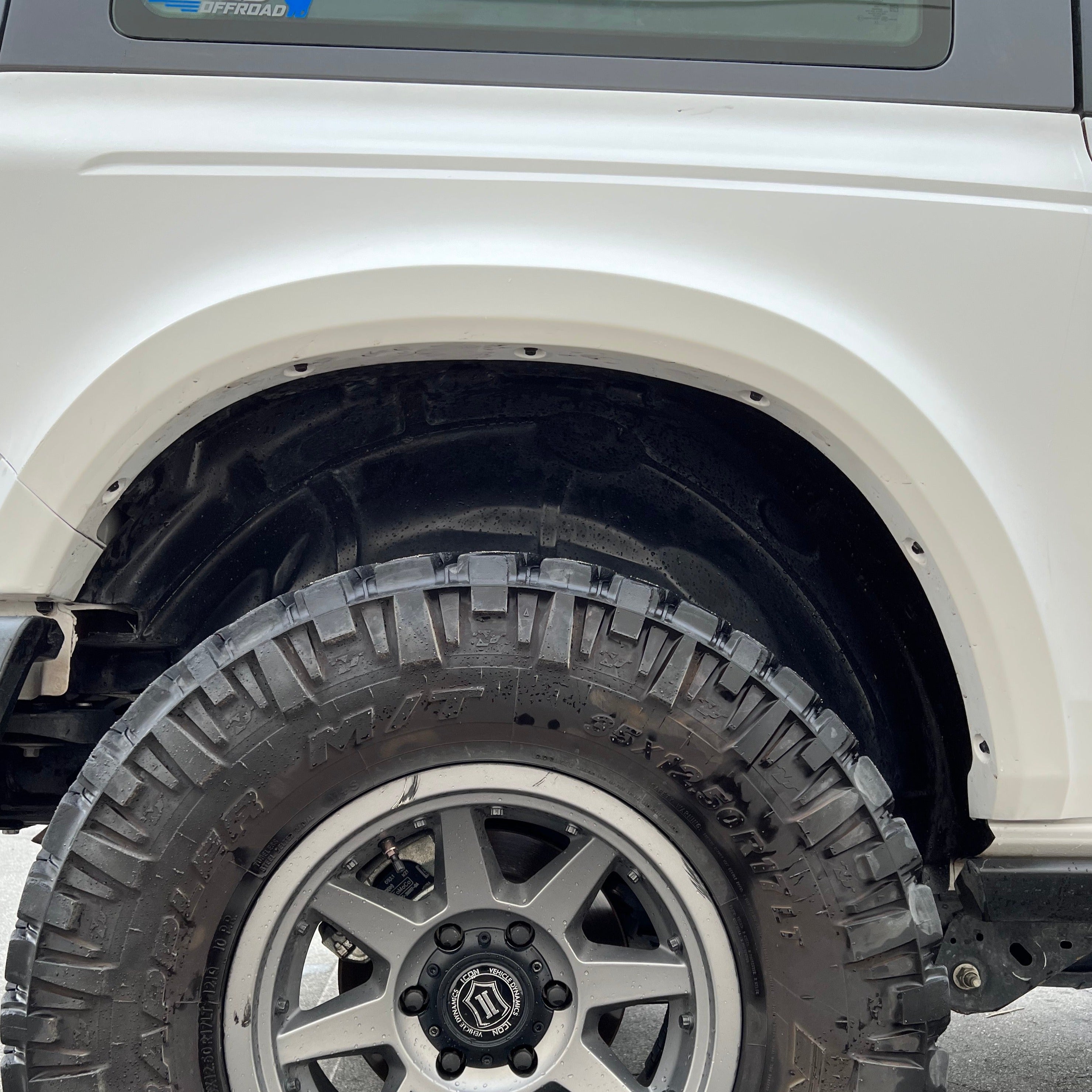 2021-2025 Ford Bronco 2-Door Rear Quarter Kit showcasing a rugged tire and enhanced wheel well for offroad performance.