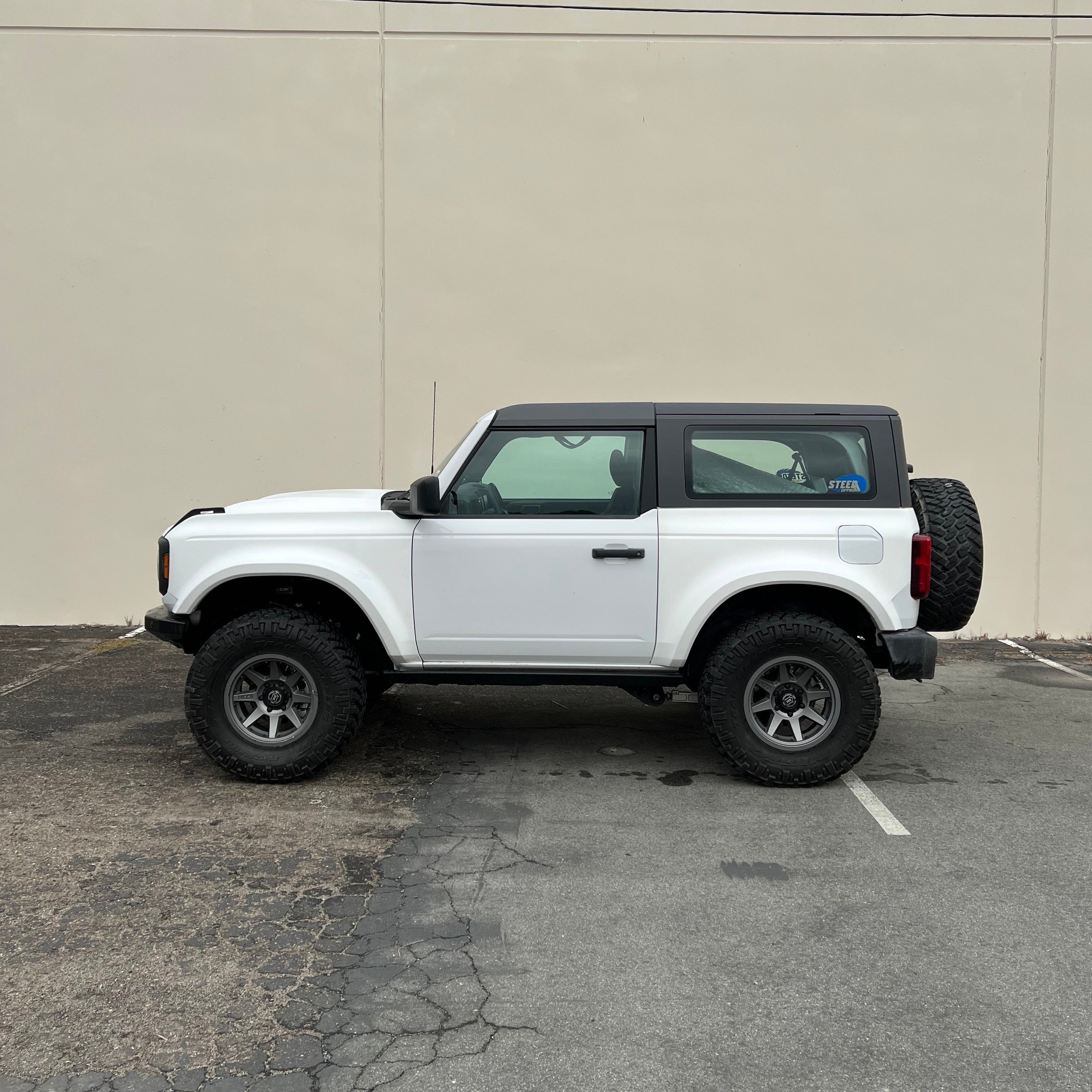2021-2025 Ford Bronco 2-Door with rear quarter kit, showcasing a rugged offroad design and enhanced tire clearance.