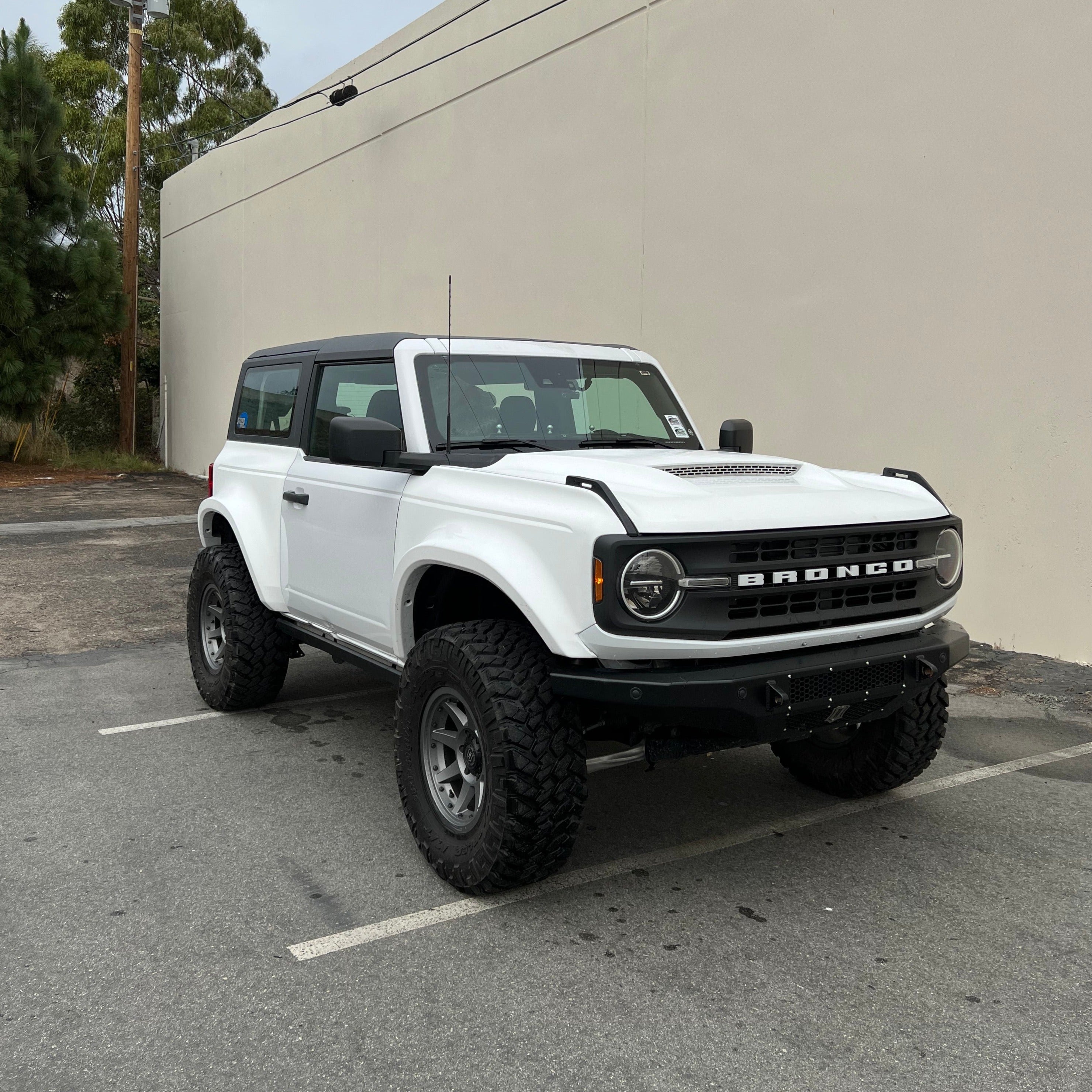 2021-2025 Ford Bronco 2-Door with a rear quarter kit, showcasing rugged off-road design and elevated stance.