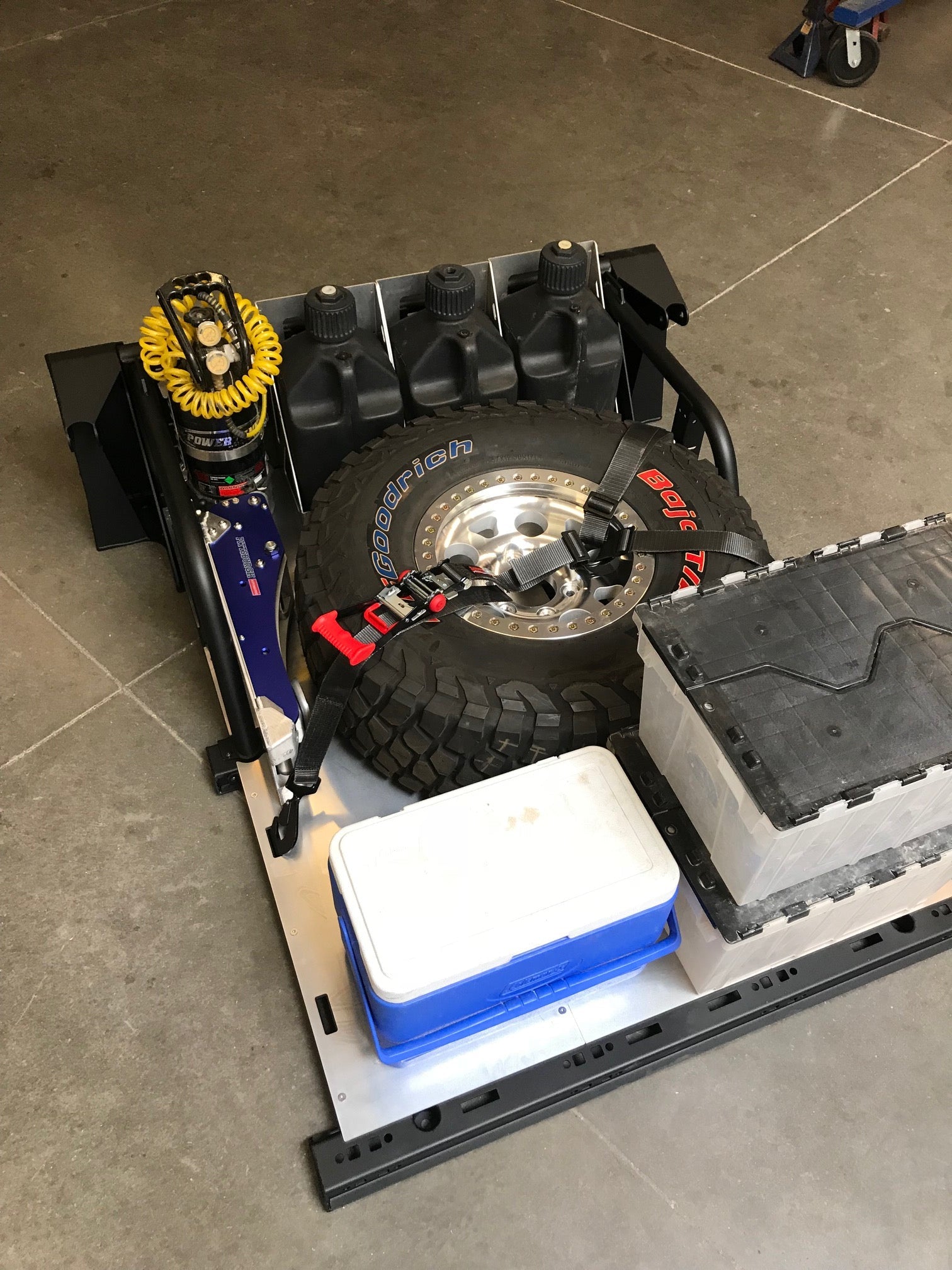 20-inch rear travel bed organizer kit for 2017-2020 Raptor, featuring storage for tools, tires, and equipment.