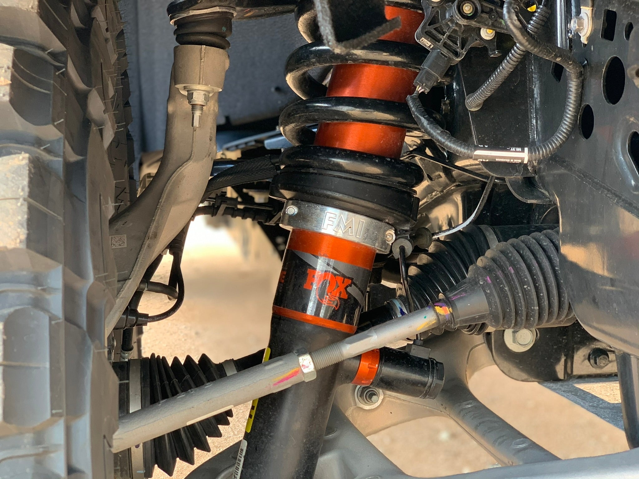 2021 and up Raptor front leveling kit showcasing a 2-inch or 1.5-inch lift with detailed suspension components.