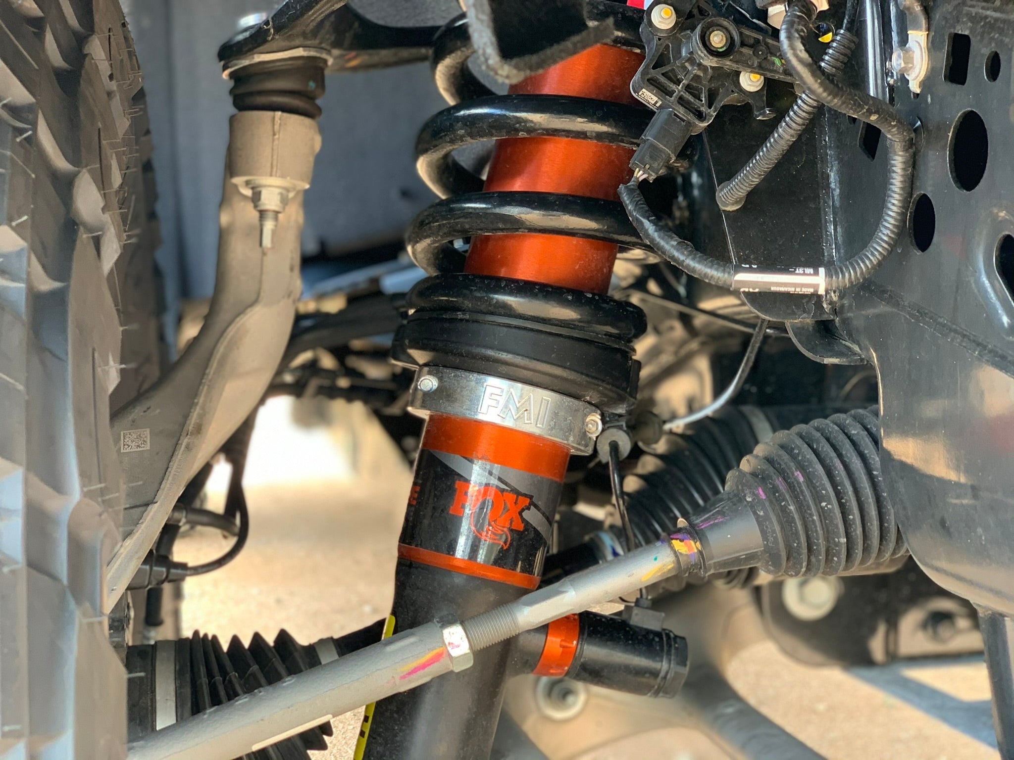 2021 and newer Raptor front leveling kit showcasing a 2-inch lift with detailed suspension components.