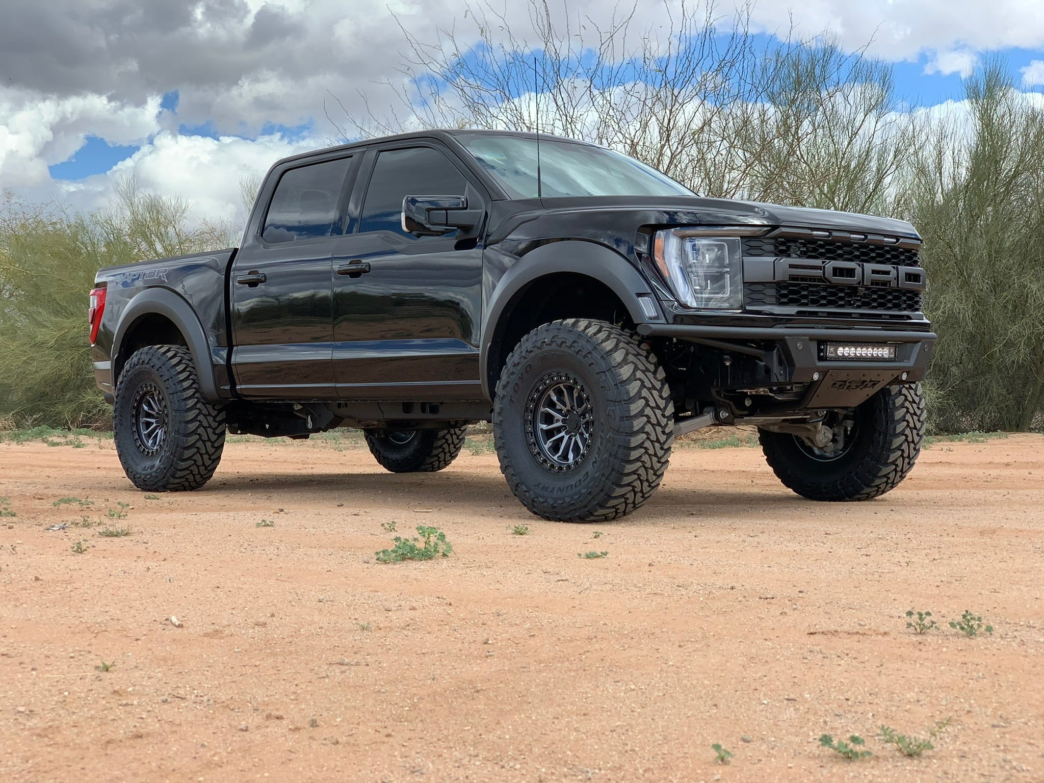 2021 and newer Raptor front leveling kit offering 2 inch or 1.5 inch lift for improved offroad performance and stance.