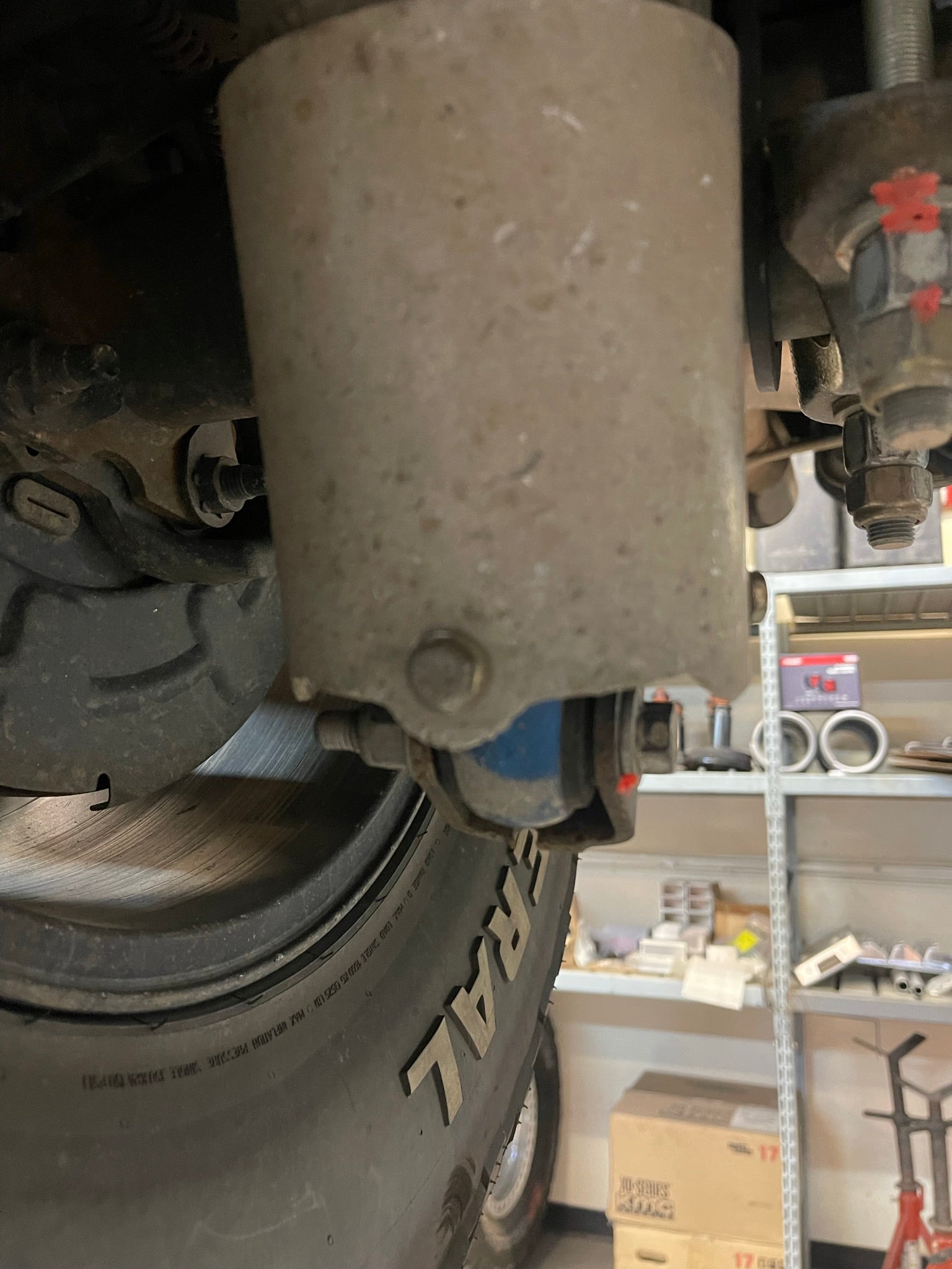 Rear shock guard for 2017-2024 Ford Raptor, designed to protect the shock from debris and damage.