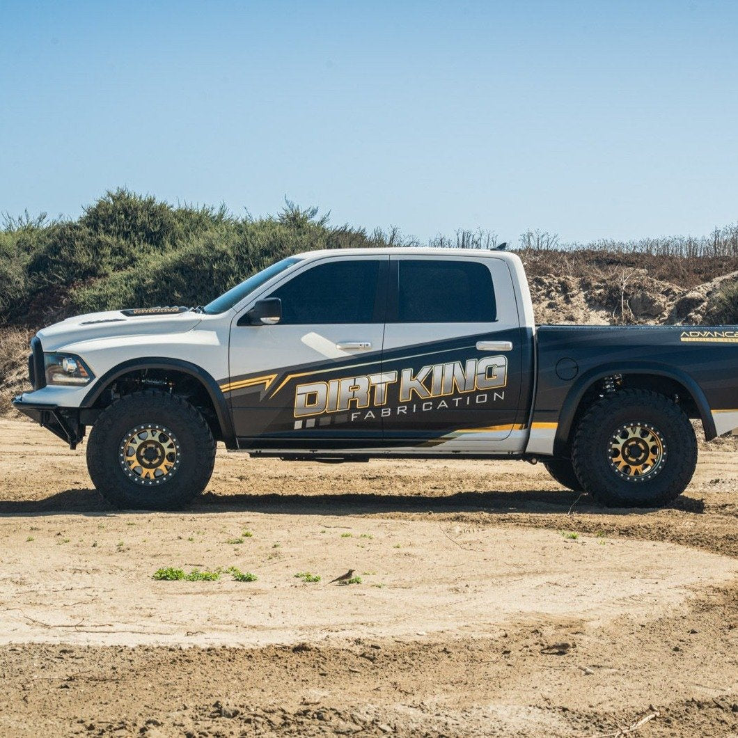 2009-2018 Dodge Ram TRX Kit displayed on a modified truck with offroad tires and custom graphics in a rugged landscape.