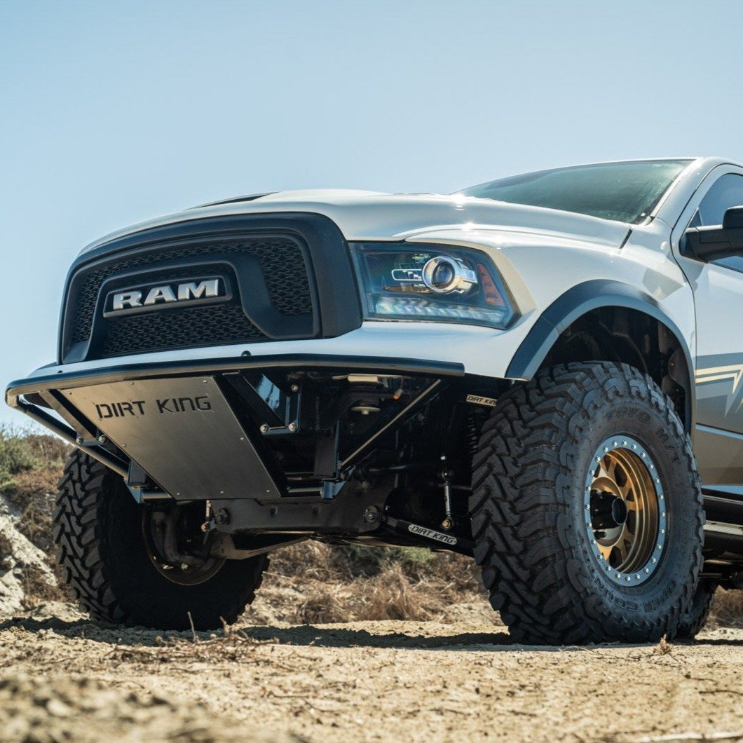 2009-2018 Dodge Ram TRX Kit showcasing a rugged truck with enhanced suspension and off-road tires on a dirt trail.