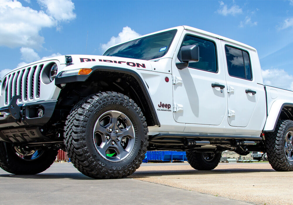 RKR Step System Full Length (1 Step Mount/1 Step per Side) 1.75 Inch Rails 2020-2025 Jeep Gladiator JT 4-Door Textured Black NFab