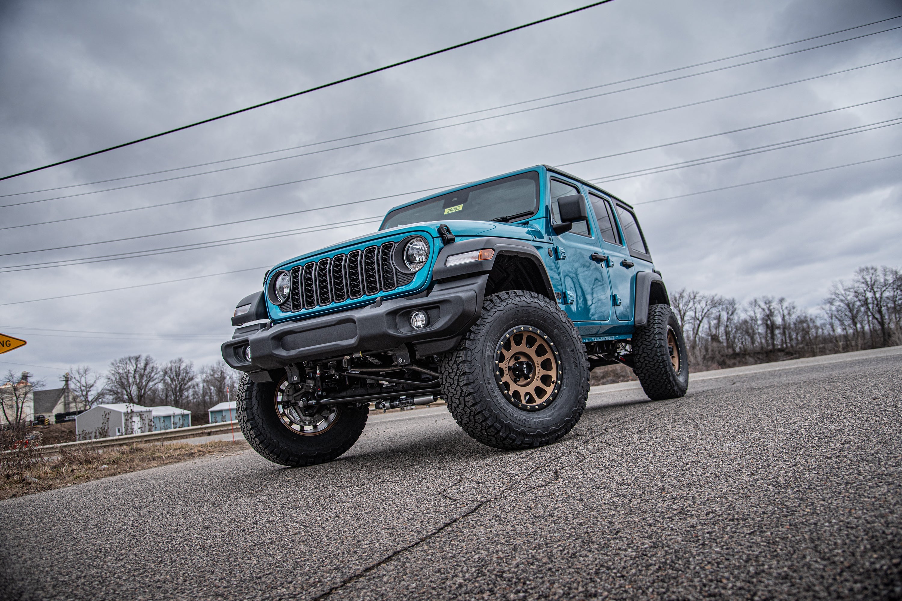 3.5-inch lift kit for Wrangler JL RHD 4-Door, showcasing enhanced off-road capability and aggressive stance.