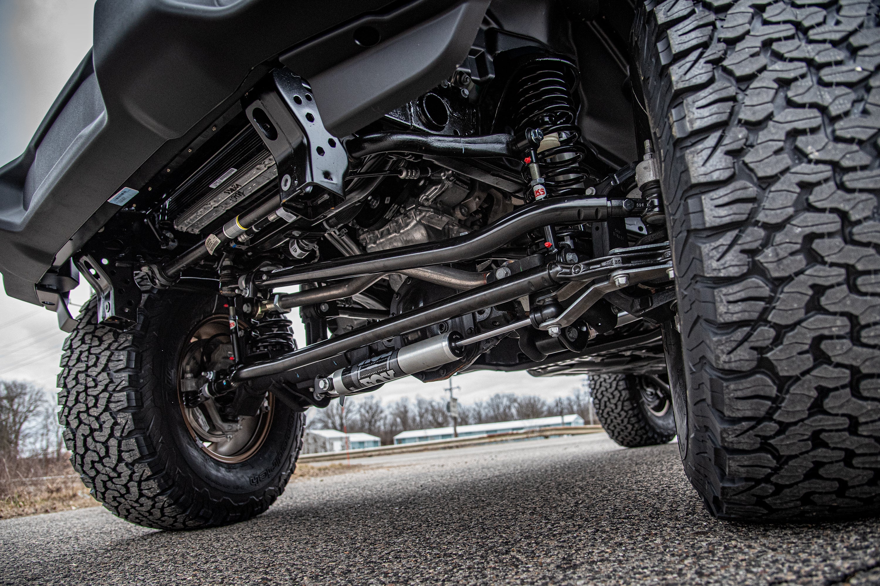 3.5-inch lift kit installed on a Wrangler JL RHD 4-Door, showcasing enhanced suspension and rugged tires for offroad performance.