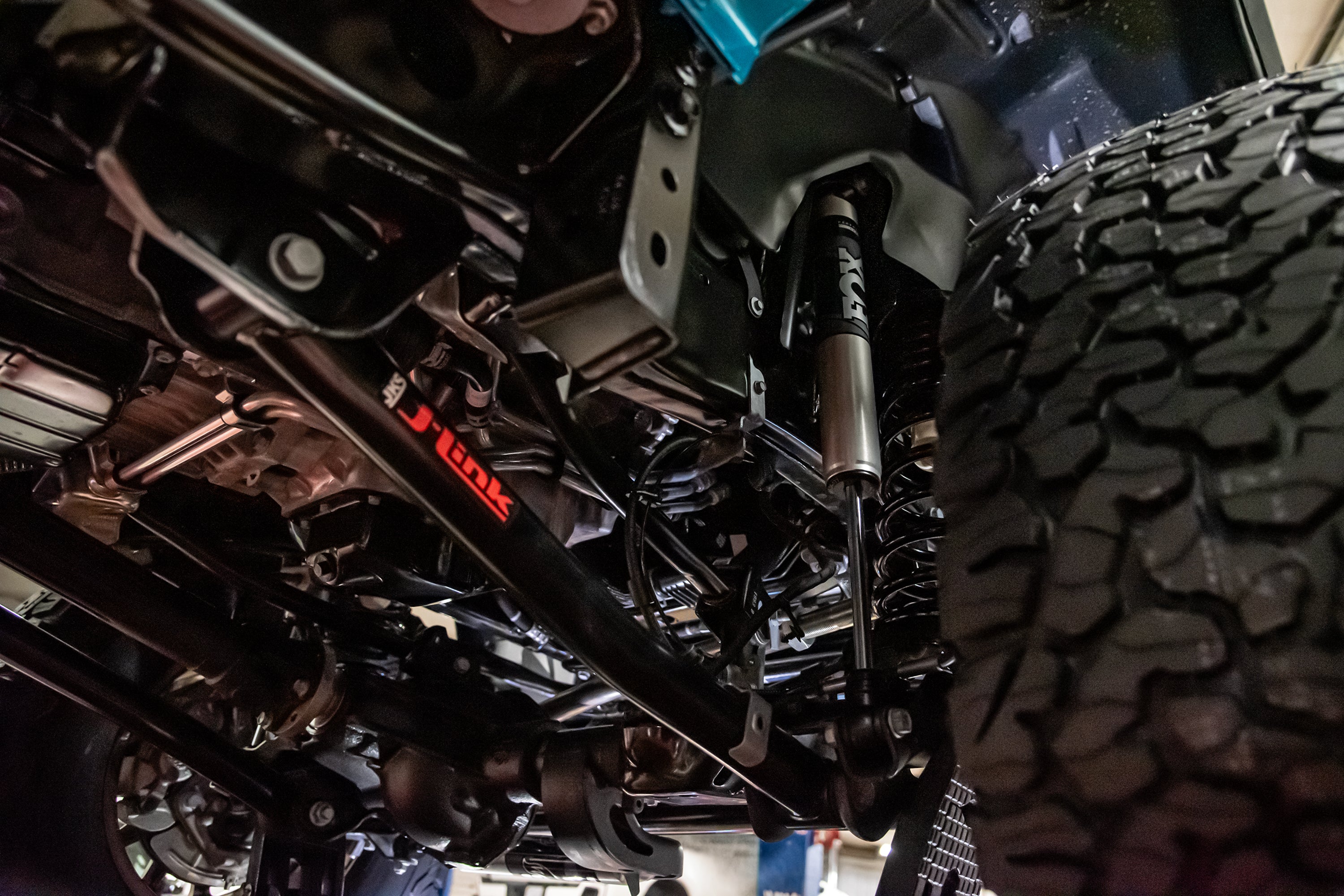 3.5-inch lift kit installed on a Wrangler JL RHD 4-Door, showcasing suspension components and rugged tires.