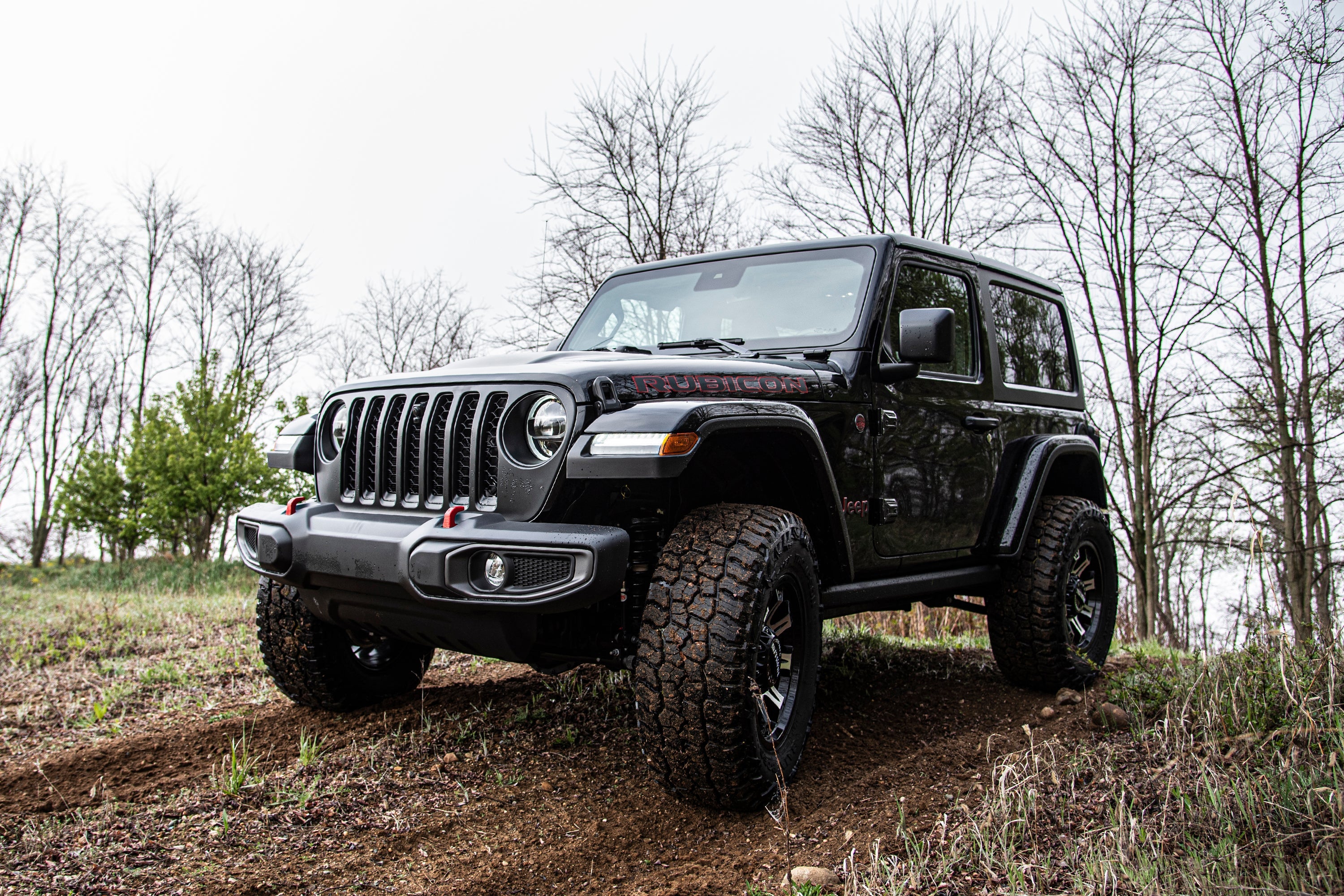 3-inch lift kit installed on a Jeep Wrangler JL 2-door, showcasing enhanced off-road capability and rugged design.