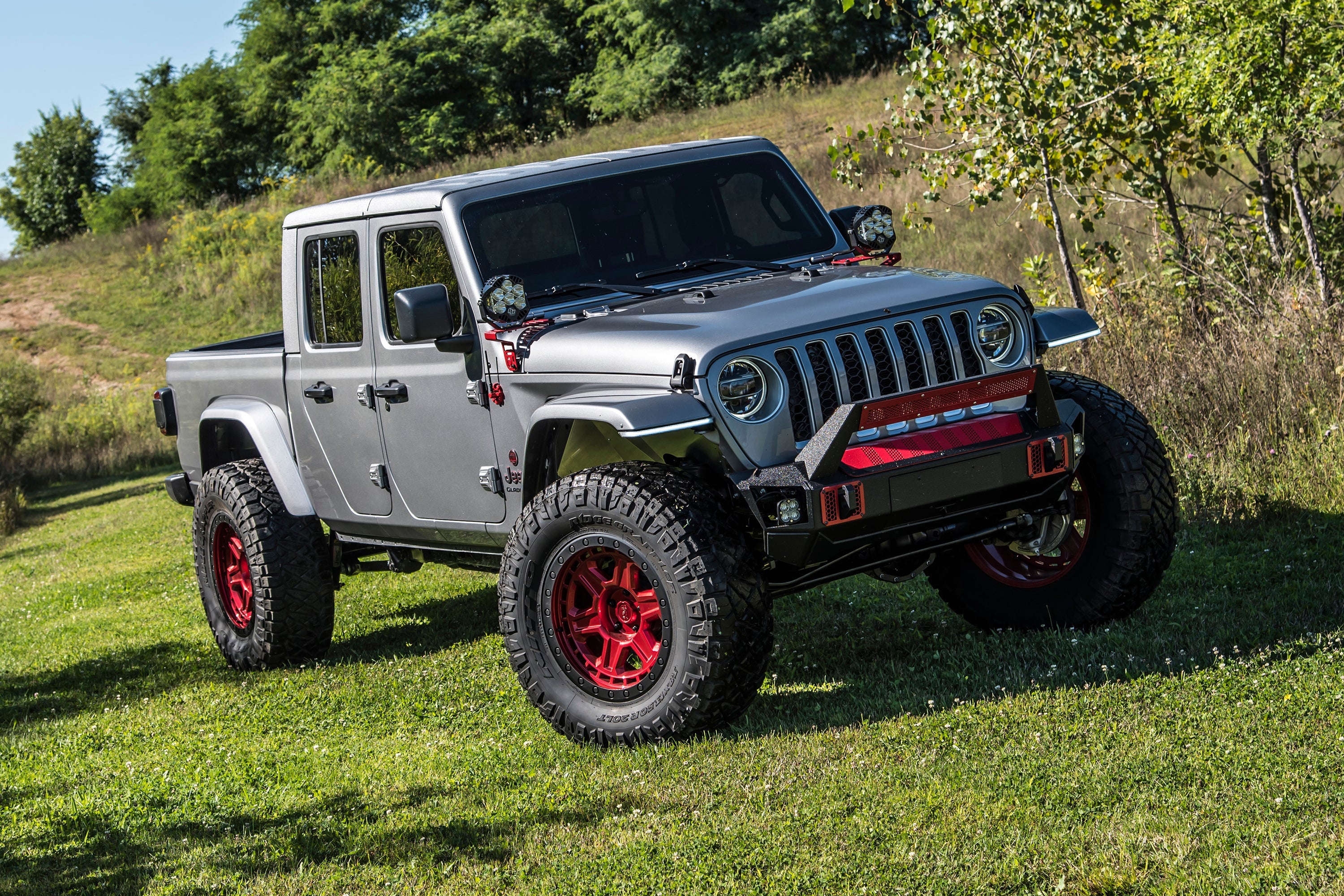 3 inch lift kit for Jeep Gladiator JT (2020-2025) enhancing off-road capability with rugged tires and aggressive stance.