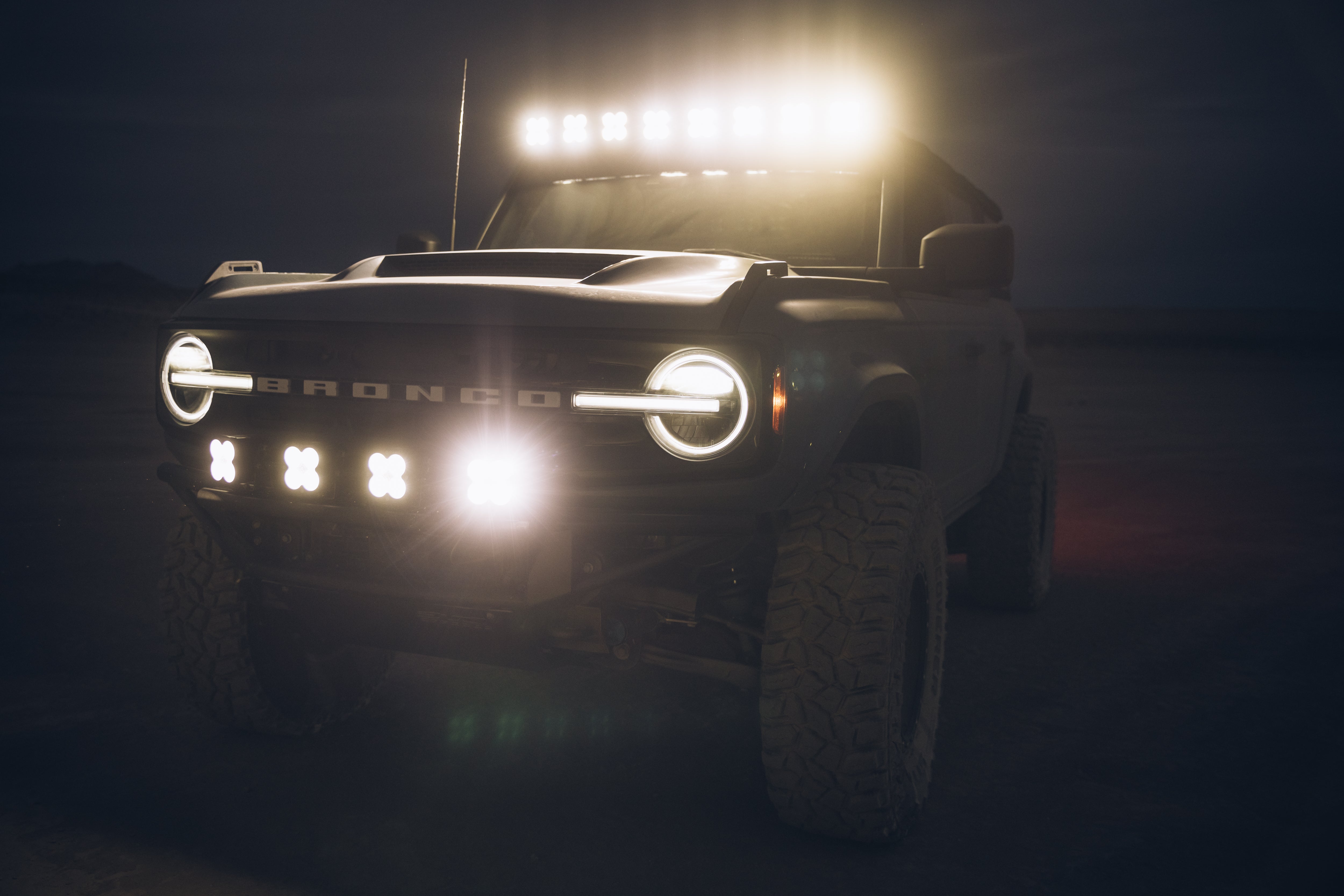 ADV Fiberglass 2021 Ford Bronco with off-road lights, showcasing a rugged design and enhanced visibility for adventures.