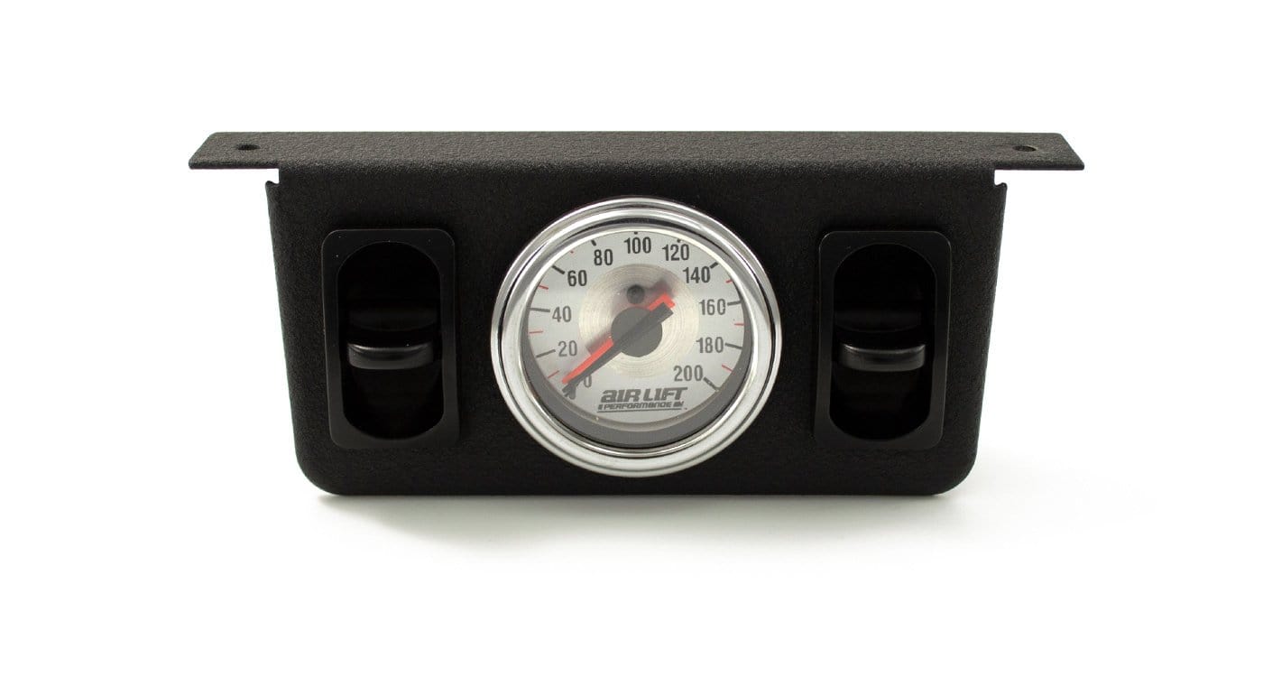 Air Lift dual needle gauge panel featuring a round gauge and dual paddle switches for precise air pressure monitoring.