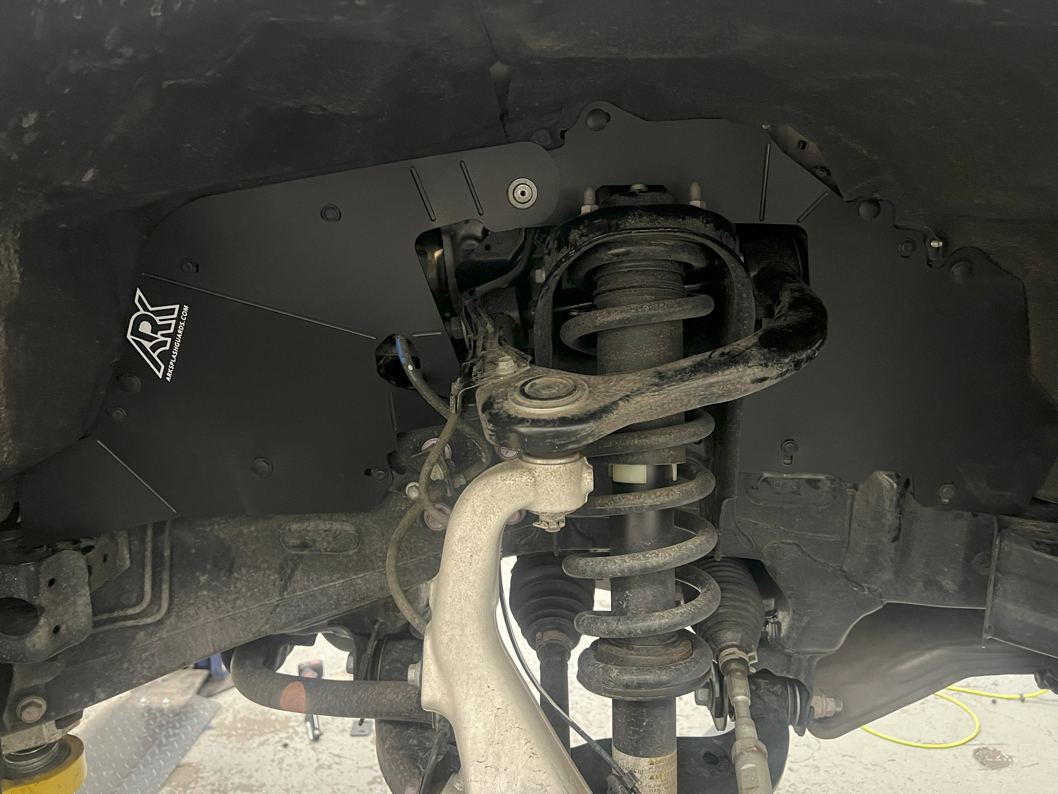 2025+ Toyota 4Runner TriXpoly splash guards installed, showcasing durable protection for offroad adventures.