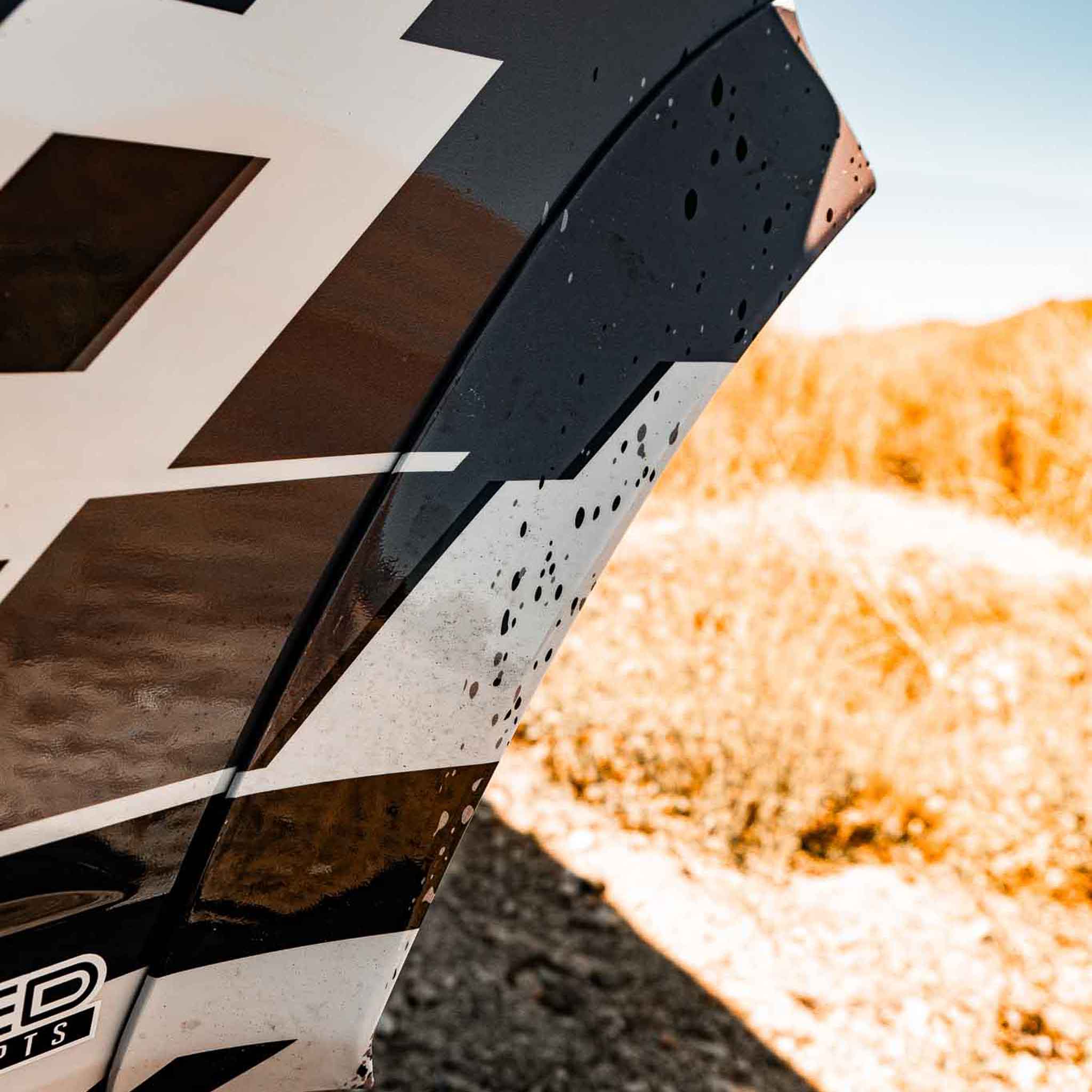 2022-2025 Ford Bronco Raptor rear quarter kit showcasing a sleek design with a glossy finish and rugged texture.