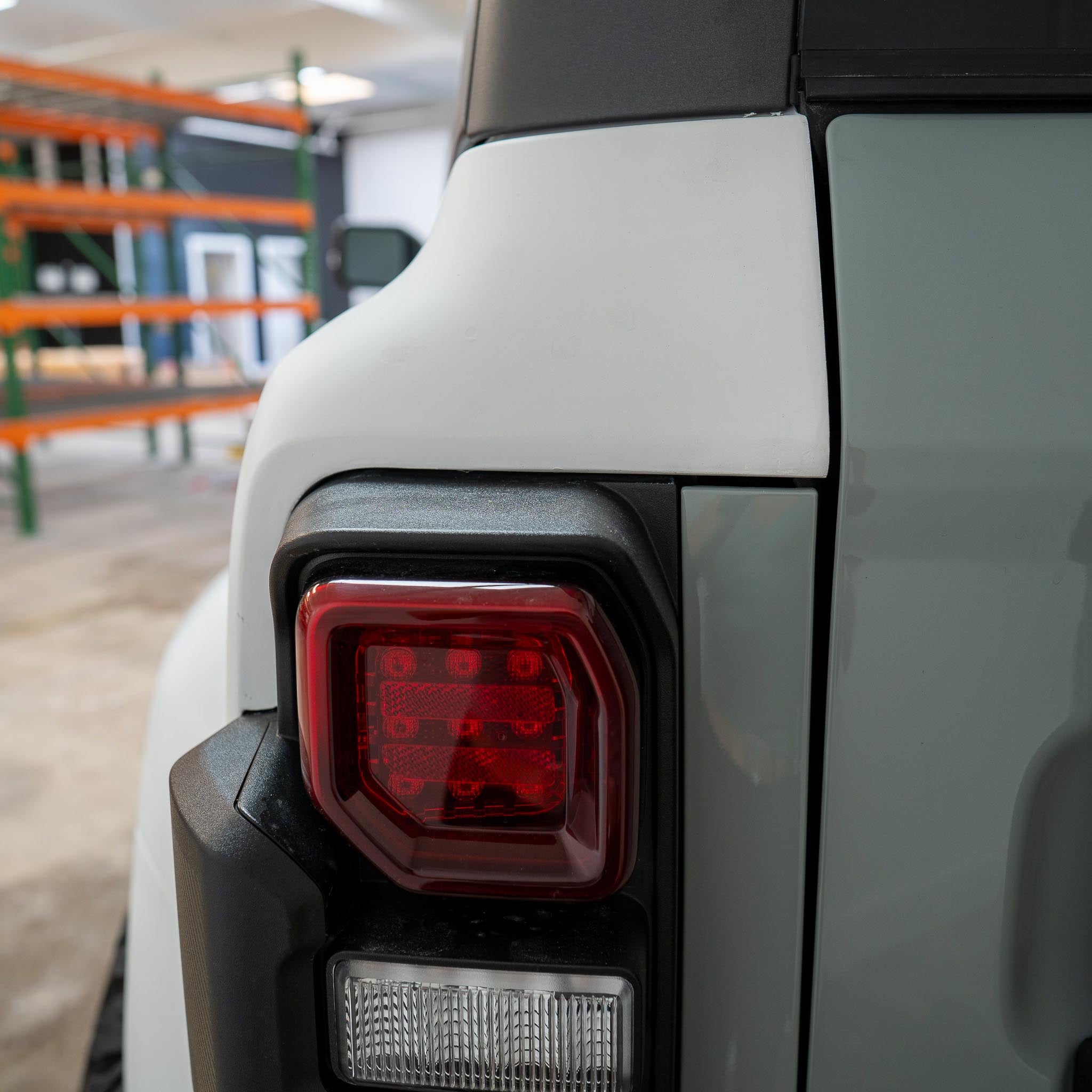 2022-2025 Ford Bronco Raptor rear quarter kit showcasing the taillight and body panel design for enhanced offroad performance.