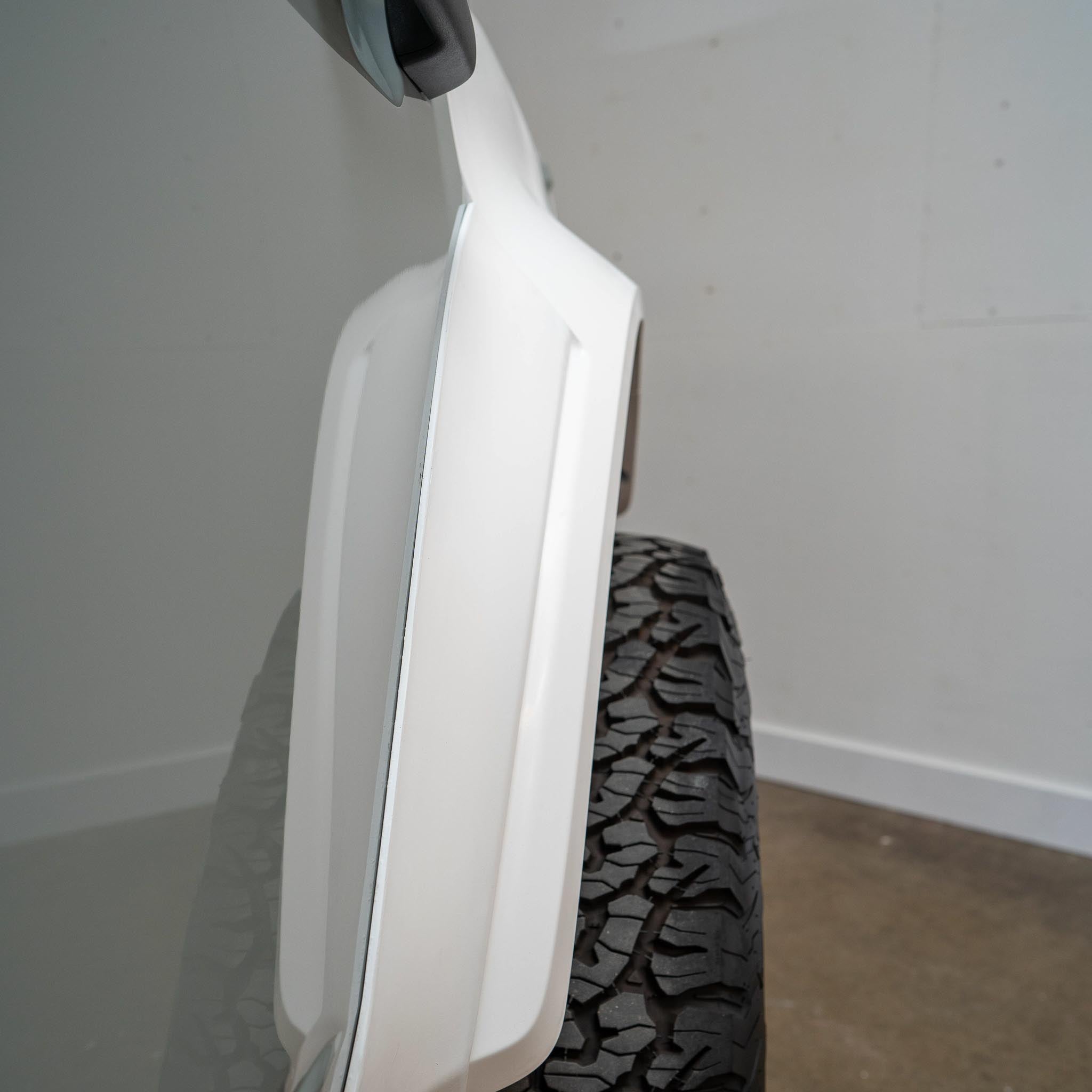 2022-2025 Ford Bronco Raptor rear quarter kit showcasing sleek design and rugged tire compatibility for offroad performance.