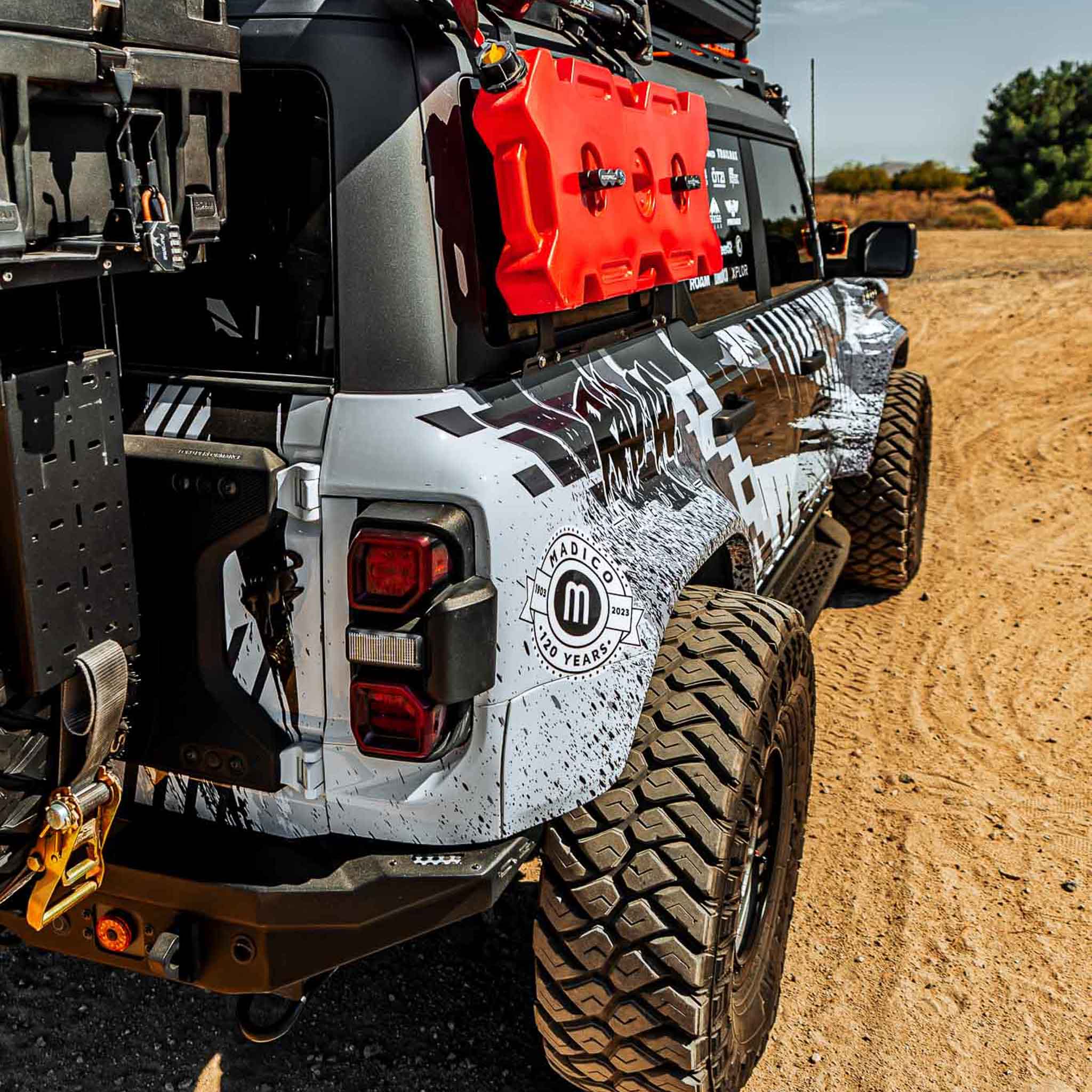 2022-2025 Ford Bronco Raptor with a rear quarter kit, showcasing rugged design and off-road capabilities.