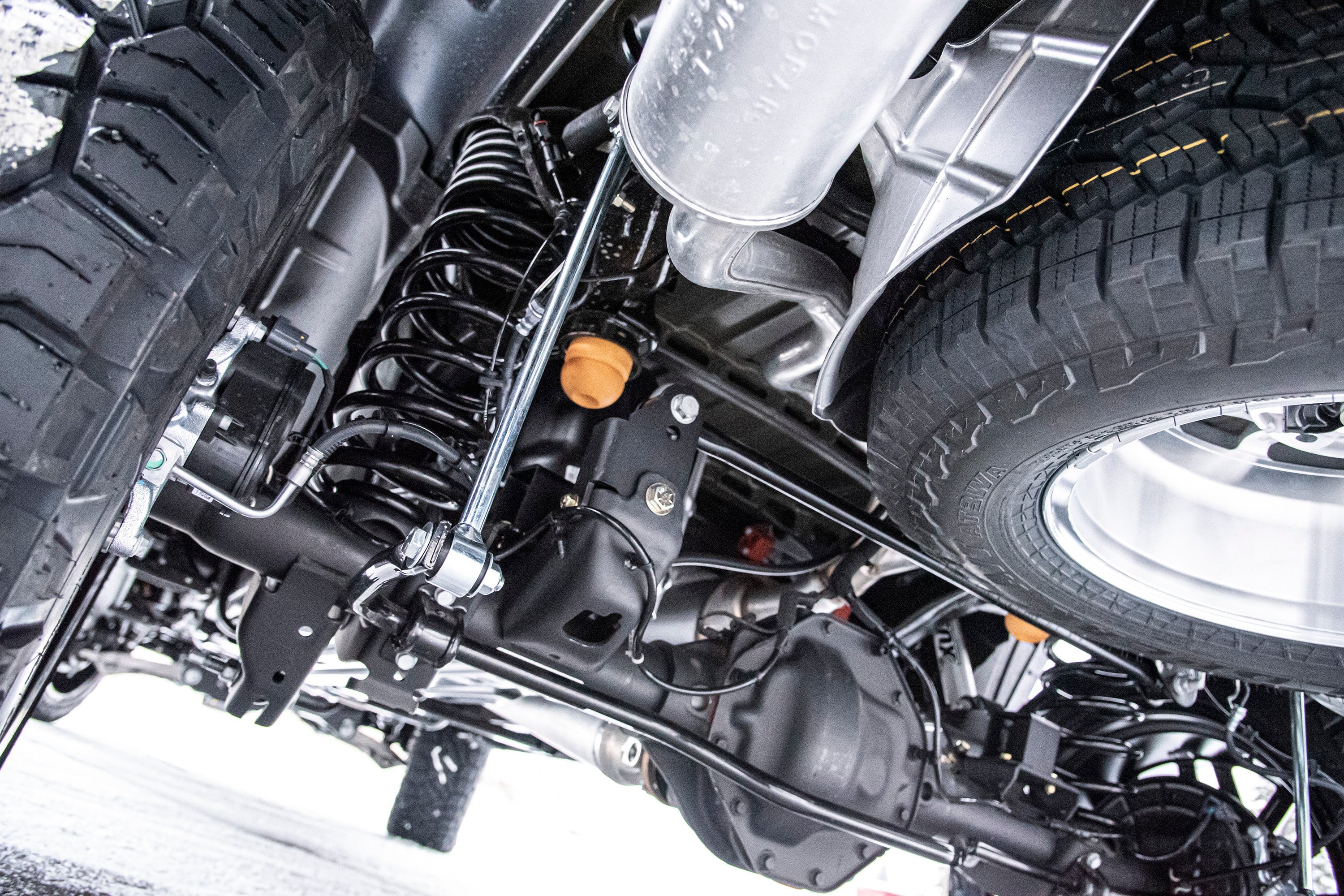 6 inch lift kit with FOX 2.5 Performance Elite coil-over installed on a Ram 1500 4WD, showcasing suspension components and tires.