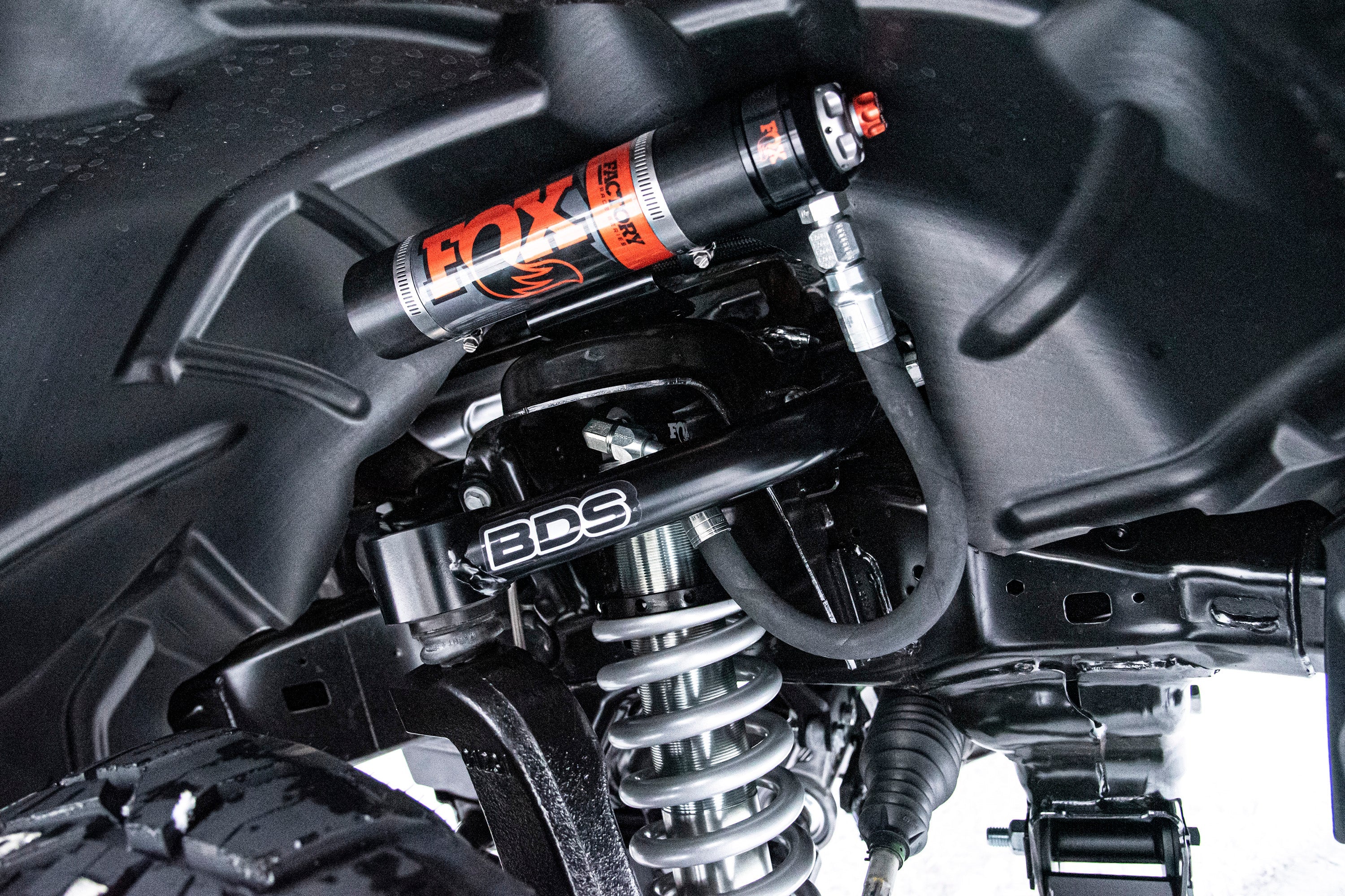 6-inch lift kit with FOX 2.5 coil-over shock for 2019-2024 Ram 1500 4WD, showcasing suspension components and design.