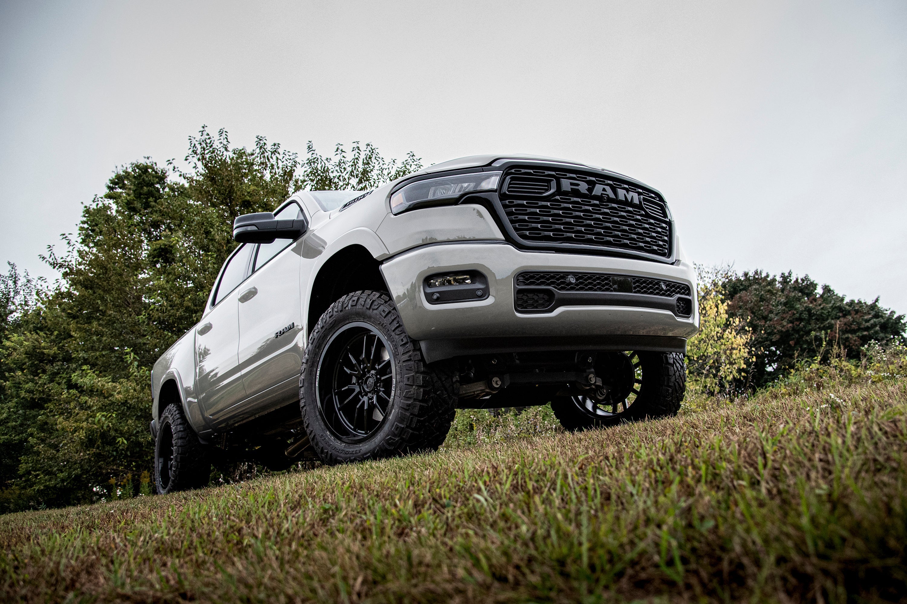 5-inch lift kit installed on a Ram 1500 Rebel, showcasing FOX 2.5 Performance Elite Coil-Over suspension on 4WD.