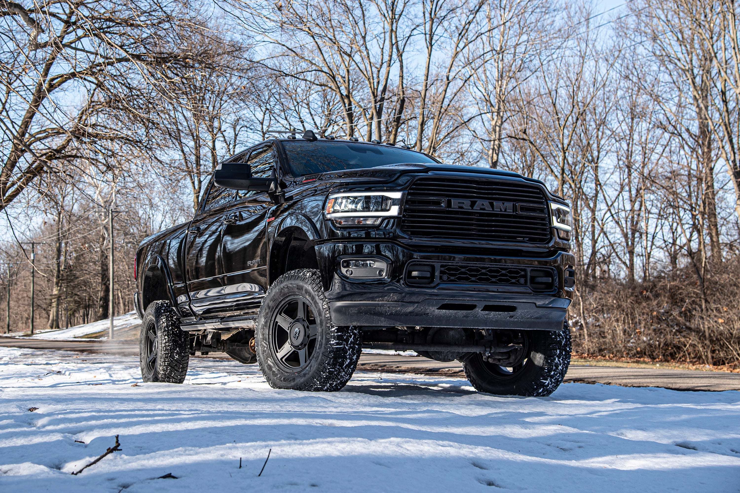 4-inch lift kit with 4-link for 2019-2024 Ram 2500 4WD diesel truck, showcasing enhanced off-road capability and style.