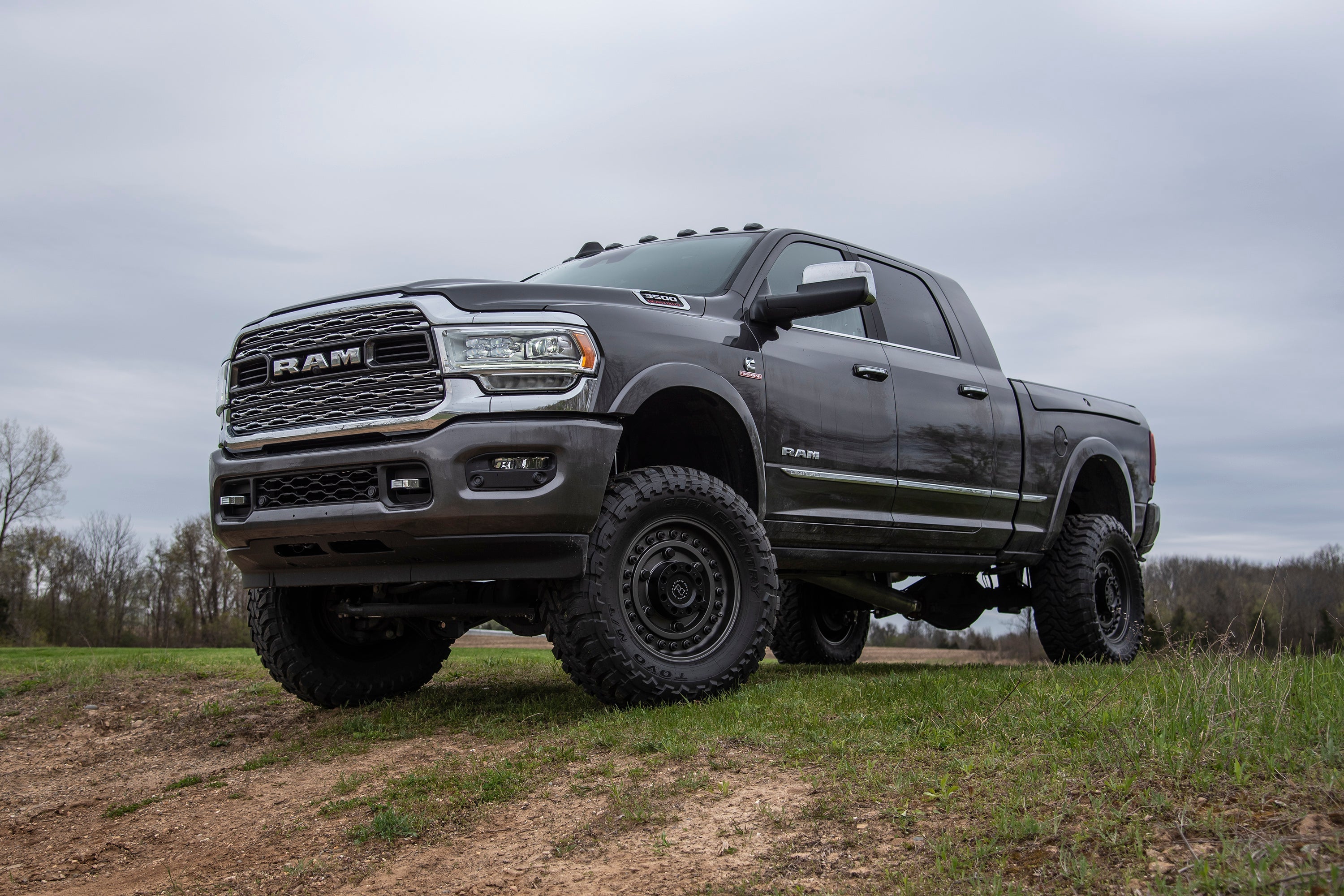 6-inch lift kit installed on a Ram 2500 4WD truck with rear air ride, showcasing enhanced off-road capability and style.