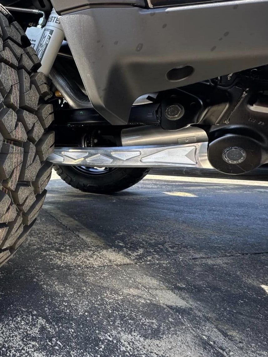 2025 Ram RHO rear lower suspension arms made of billet aluminum, showcasing durability and performance for offroad vehicles.