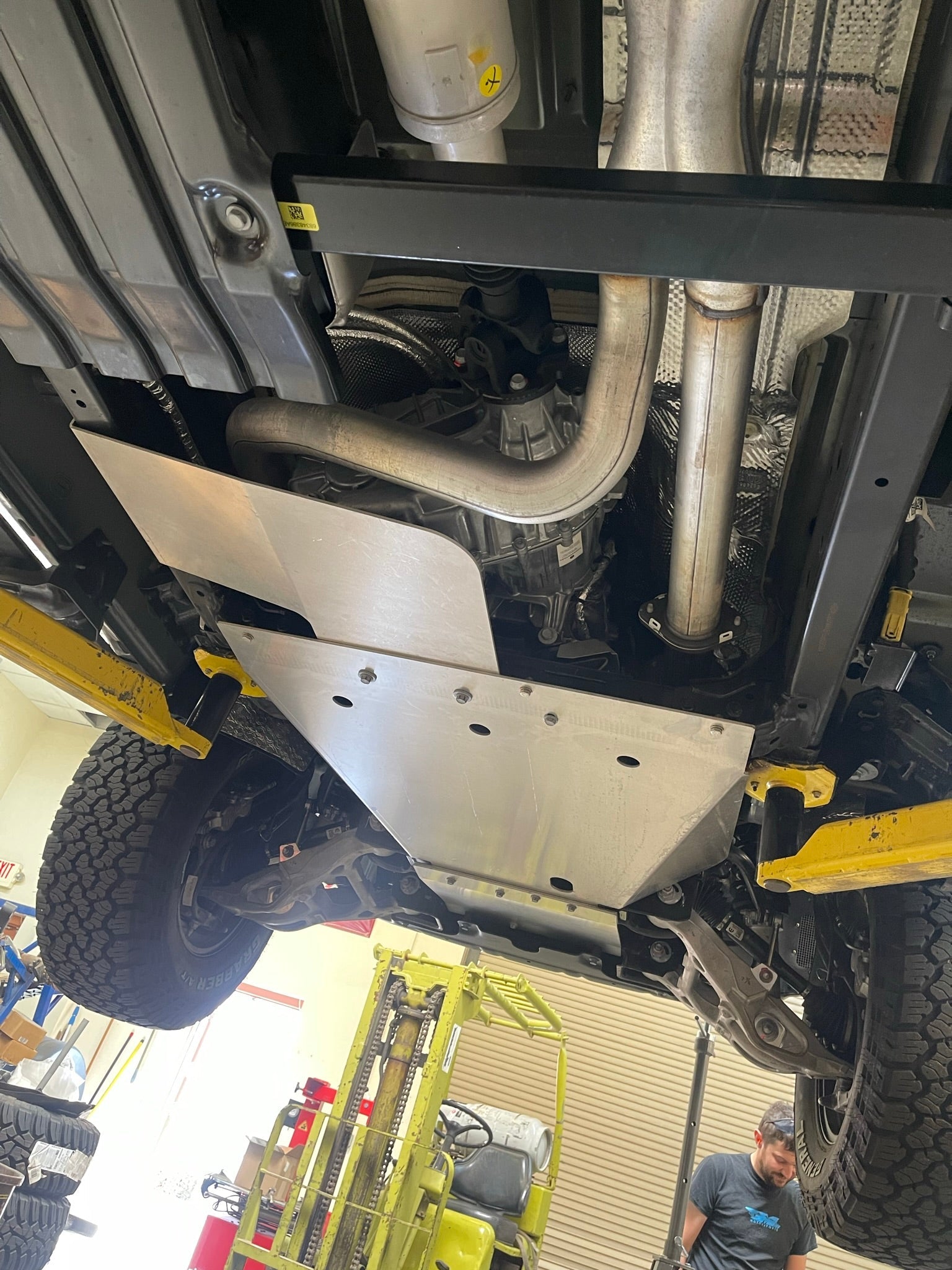 2021-2024 Ram TRX skid plate kit installed under the vehicle, showcasing durable protection for offroad adventures.