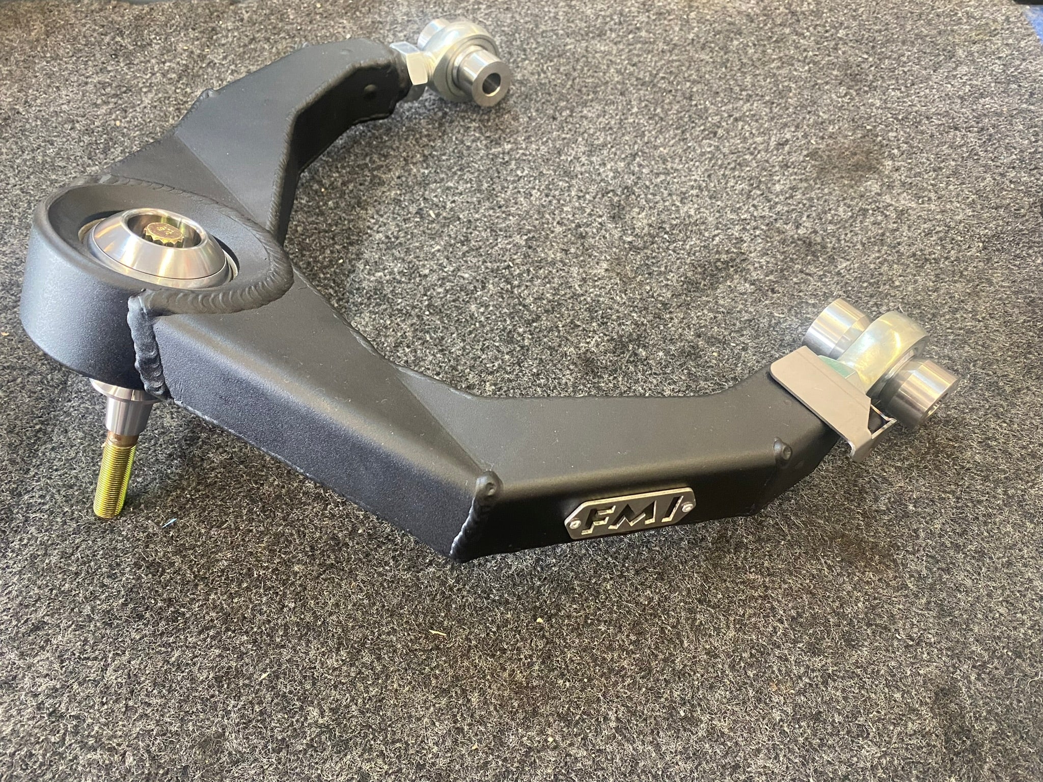 Fabricated upper arm kit for 2021-2024 Ram TRX, designed for enhanced performance and durability in offroad applications.